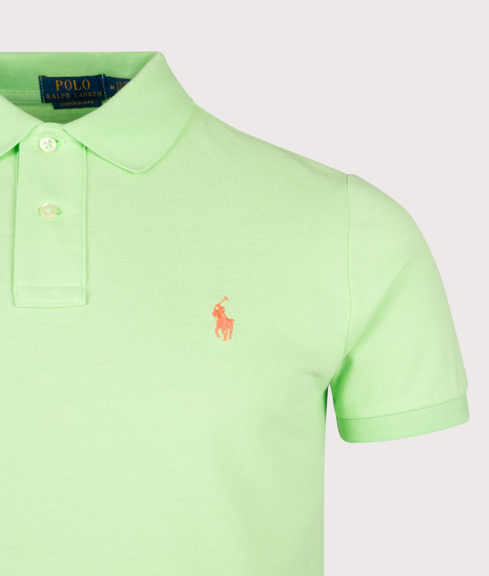 Polo Ralph Lauren Custom Slim Fit Mesh Polo Shirt in Cruise Lime at EQVVS Menswear. Detail shot.