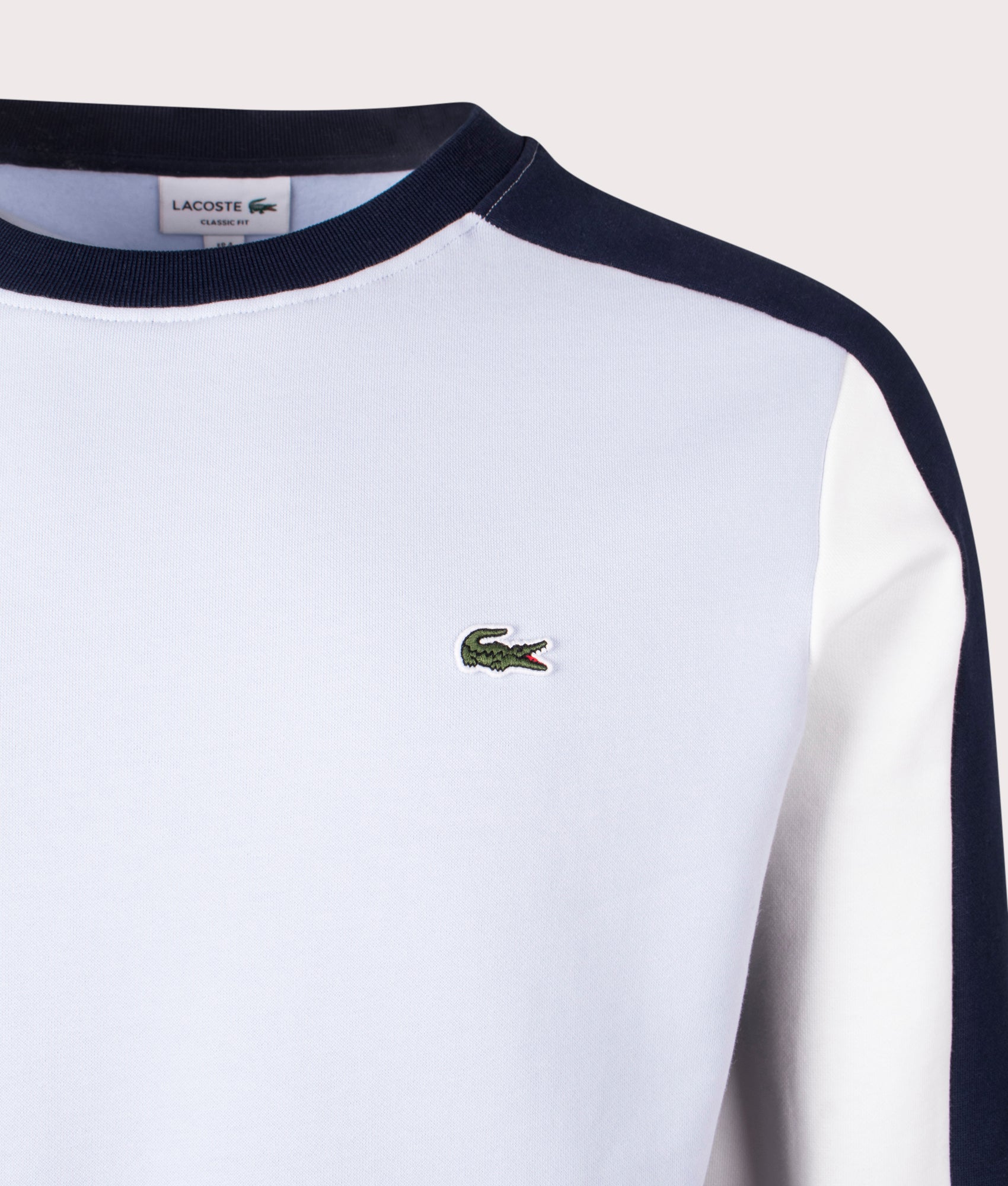 Lacoste Brushed Fleece Colourblock Sweatshirt in Navy, Phoenix Blue & Yellow Detail Shot at EQVVS