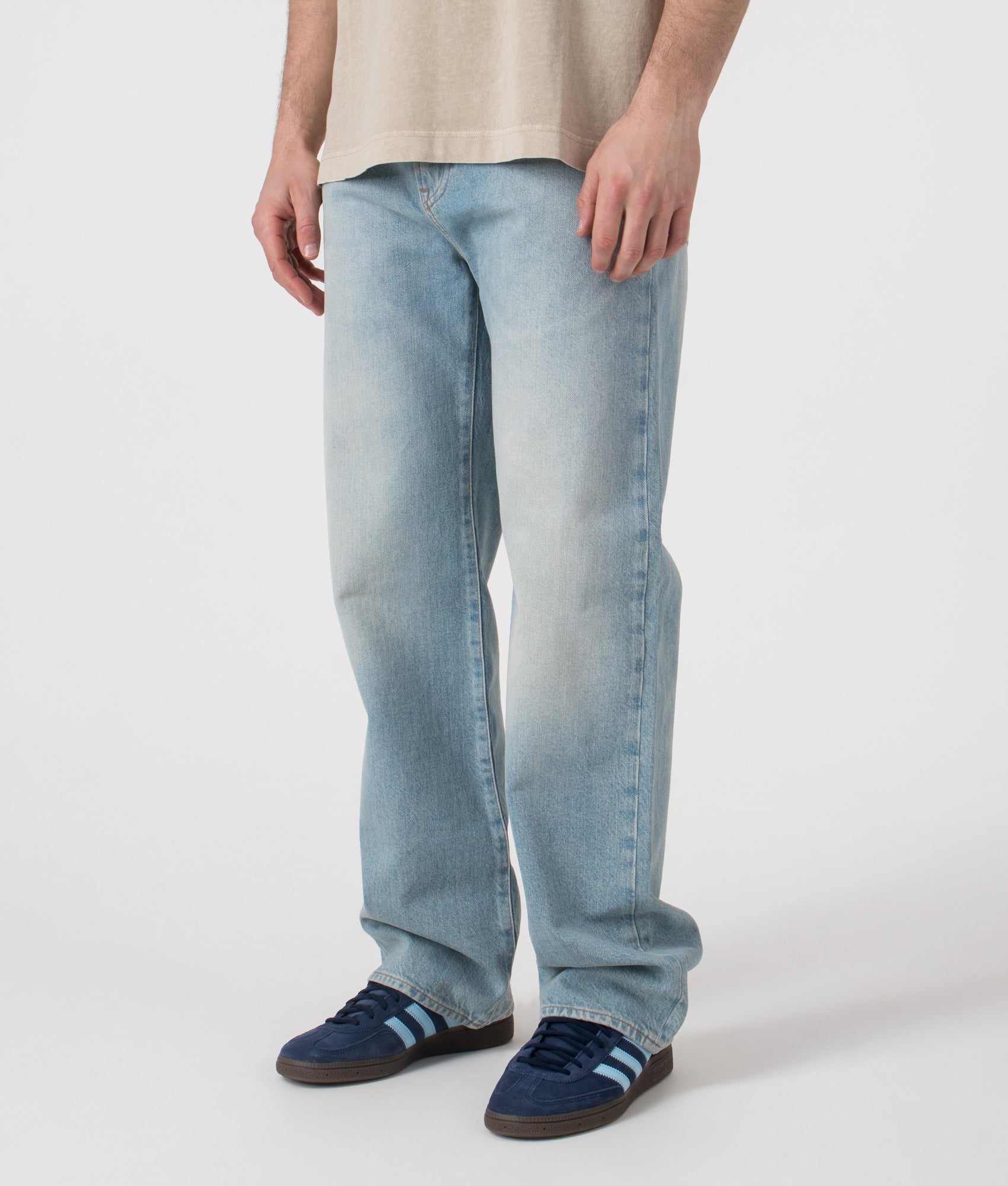 Straight Cut Indigo Jeans. Shot by EQVVS. Front Angled shot.
