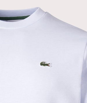 Lacoste Relaxed Fit Organic Brushed Cotton Sweatshirt in Phoenix Blue Detail Shot at EQVVS