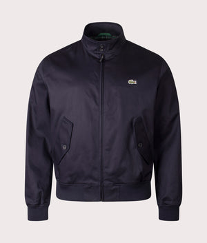 Lacoste Waterproof Twill Harrington Jacket in Abysm at EQVVS Menswear. Front shot.
