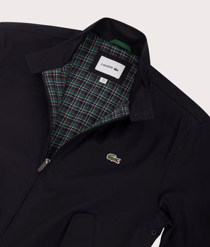 Lacoste Waterproof Twill Harrington Jacket in Abysm at EQVVS Menswear. Collar detail shot.