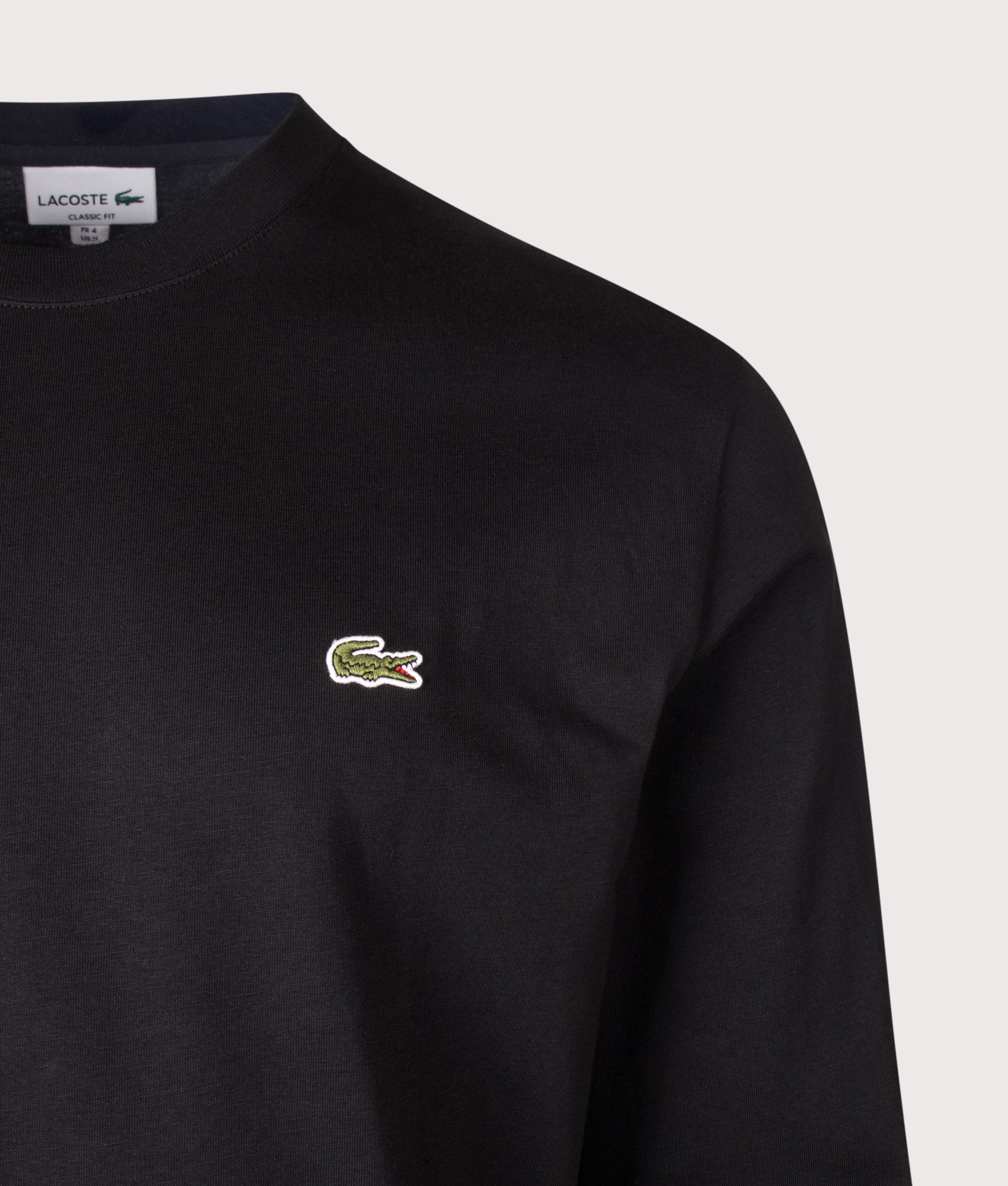 Lacoste Classic Fit Long Sleeved Cotton T-Shirt in Black at EQVVS Menswear. Detail shot.
