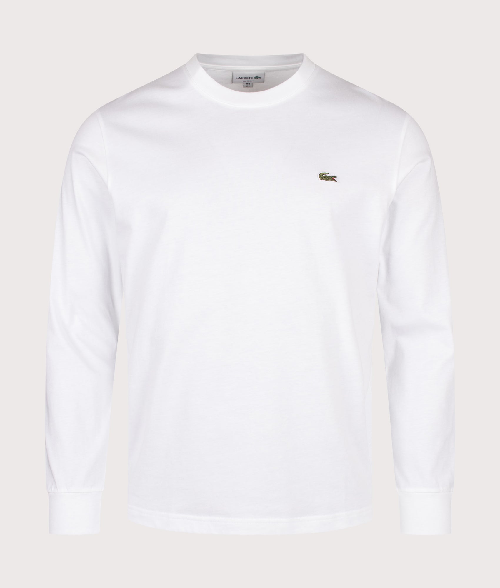 Lacoste Classic Fit Long Sleeved Cotton T-Shirt in White at EQVVS Menswear. Front shot.