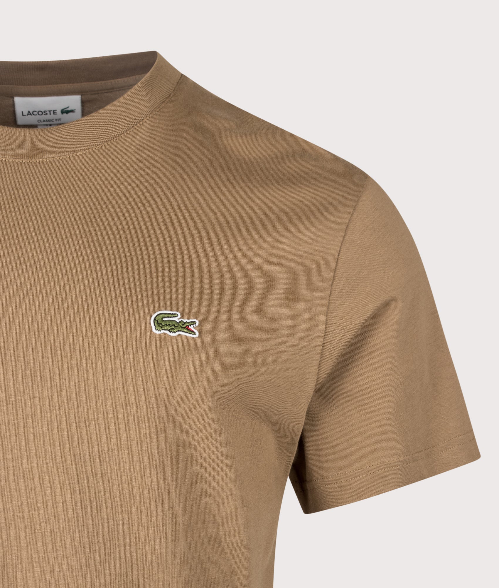 Lacoste Regular Fit Cotton T-Shirt in Cookie at EQVVS Menswear. Detail shot.
