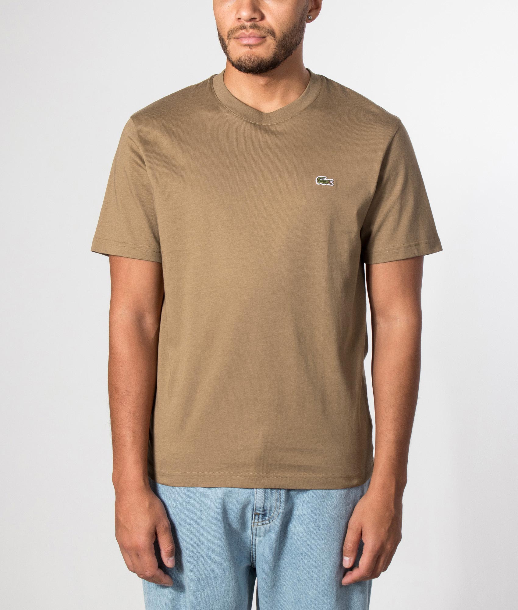 Lacoste Regular Fit Cotton T-Shirt in Cookie at EQVVS Menswear. Model front shot.