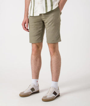Slim Fit Bermuda Shorts. Shot by EQVVS. Side angled shot.