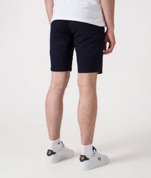 Slim Fit Bermuda Shorts. Shot by EQVVS. Back shot.