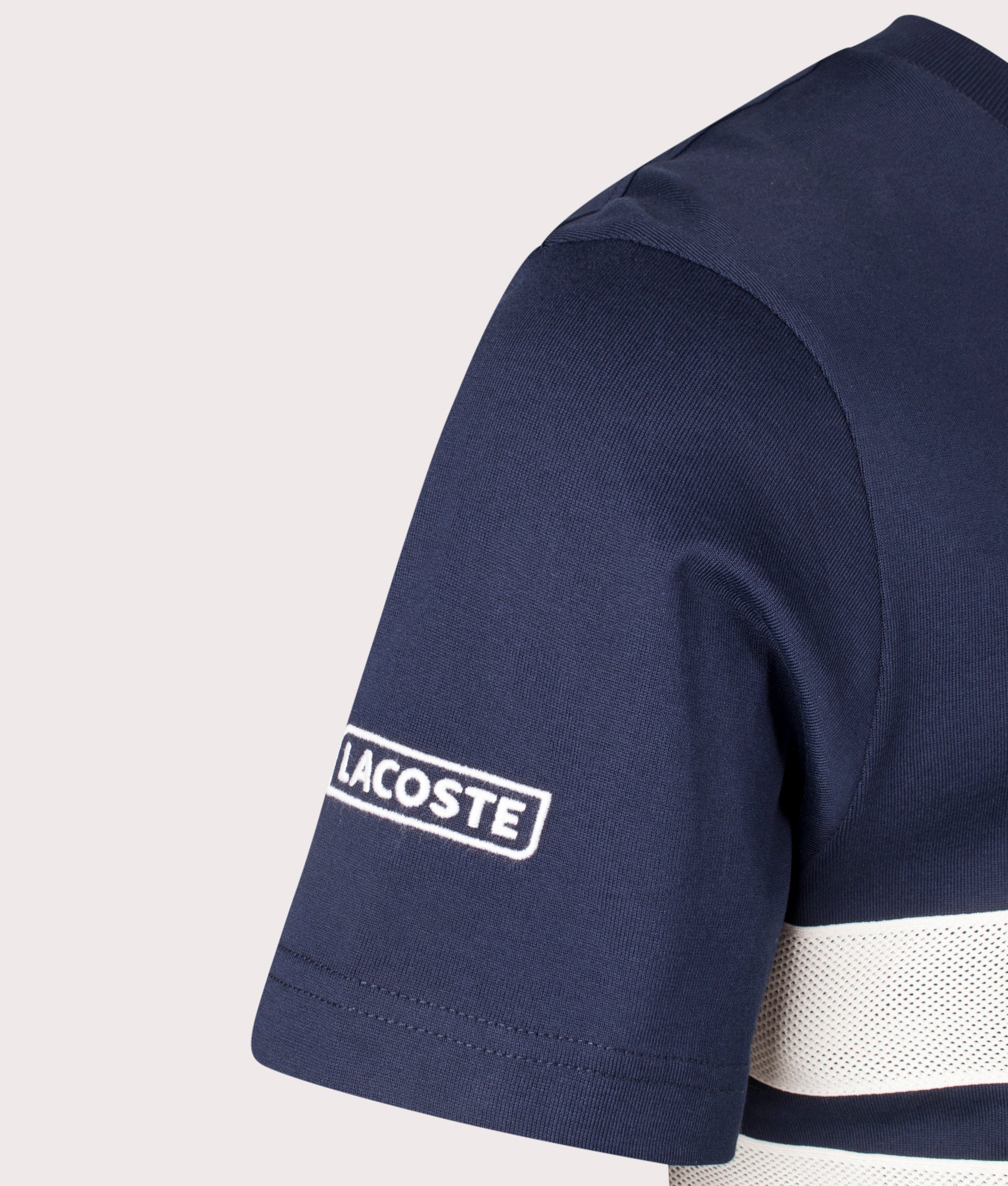 Lacoste Heavy Jersey Mesh Band T-shirt in Navy Blue. Shot at EQVVS. Side detail shot