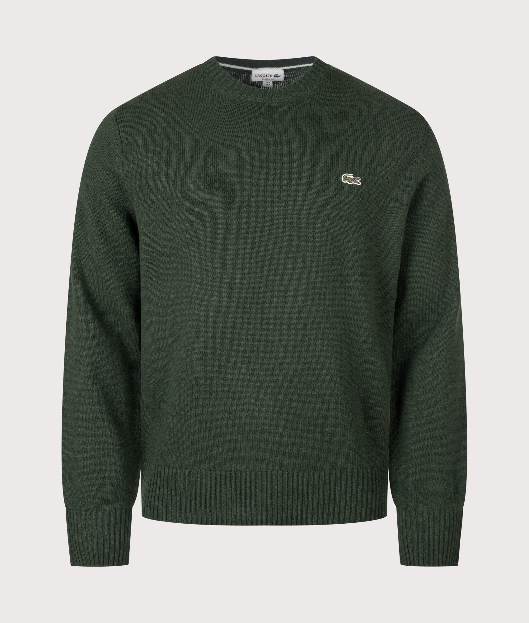 Lacoste Classic Fit Wool Crewneck Jumper in Sinople Green at EQVVS Menswear. Front shot.