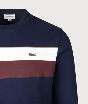 Colourblock Fleece Sweatshirt in Navy Blue/Flour-Red Vermouth. | 100% Cotton| Lacoste | Shot at EQVVS | Front detail shot 