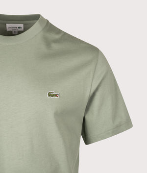 Cotton T-Shirt by Lacoste in Thyme. Shot by EWQVVS. Front detail shot