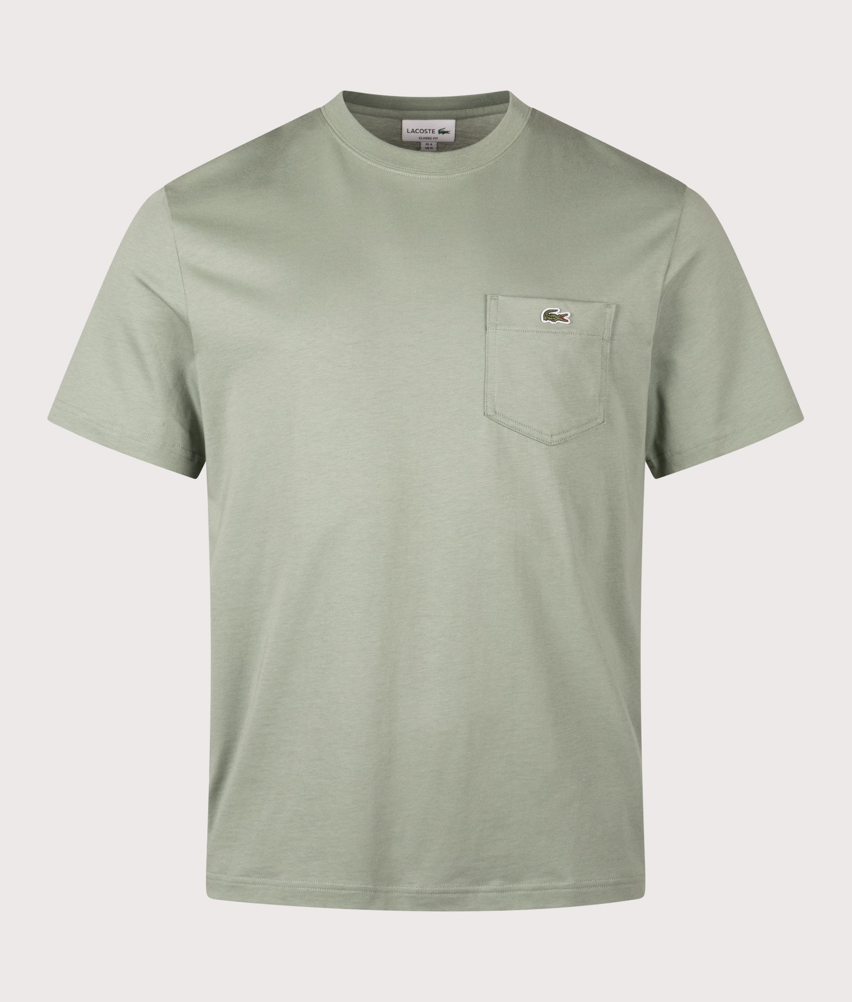 Cotton T-Shirt with Breast Pocket by Lacoste in Thyme. Shot by EQVVS. Front shot.