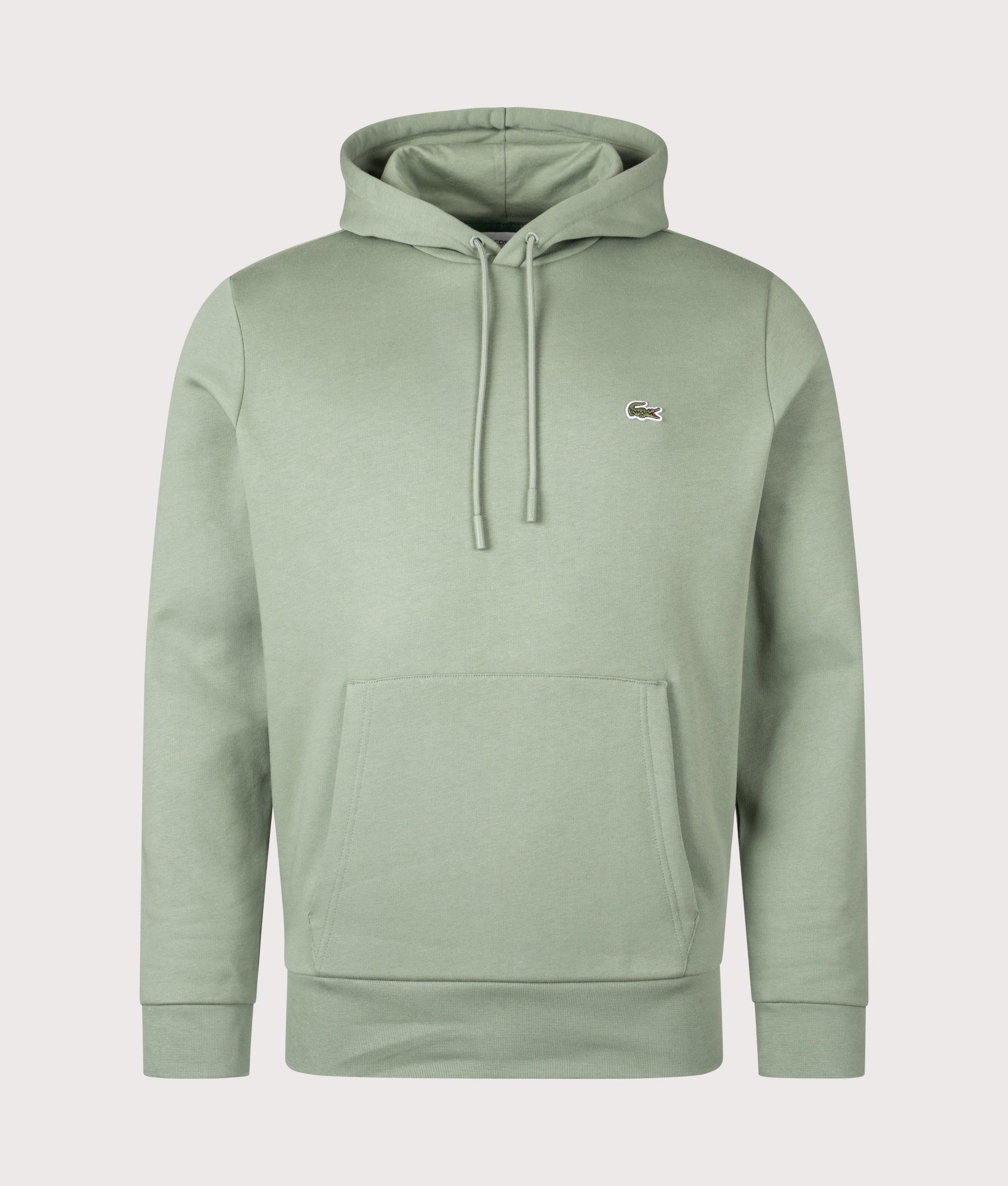 Lacoste Brushed Fleece Hoodie in Thyme at EQVVS Menswear. Front shot.