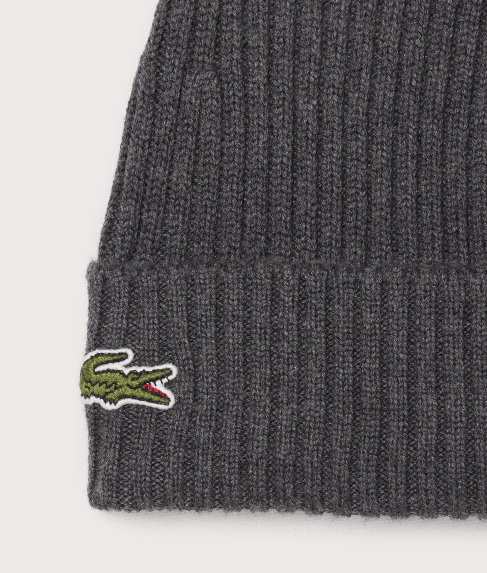 Lacoste Rib Knit Brushed Wool Beanie in Pitch Chine at EQVVS Menswear. Detail shot.