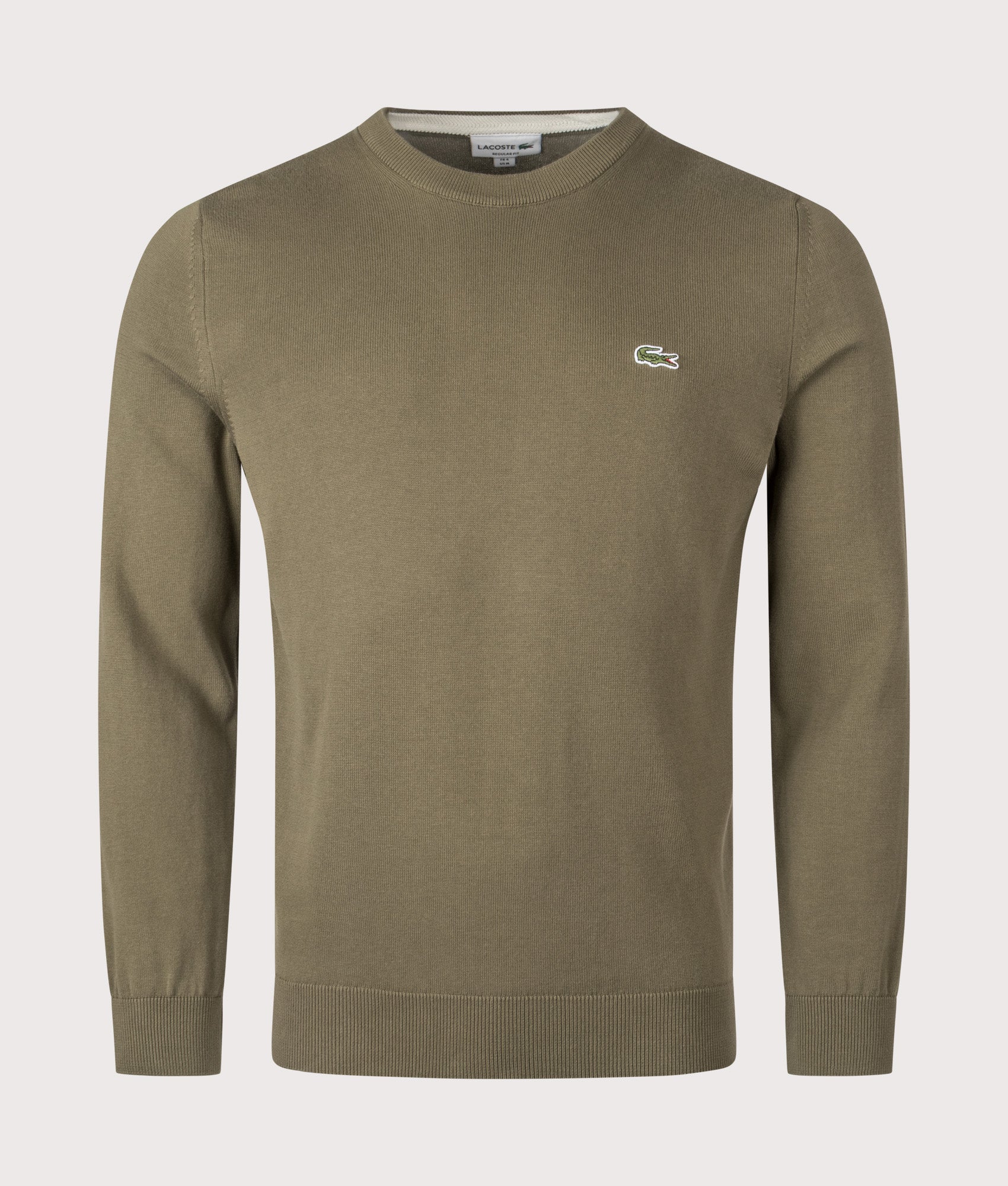 Lacoste Monochrome Crew Neck Cotton Sweatshirt in Khaki Green at EQVVS Menswear. Front shot.