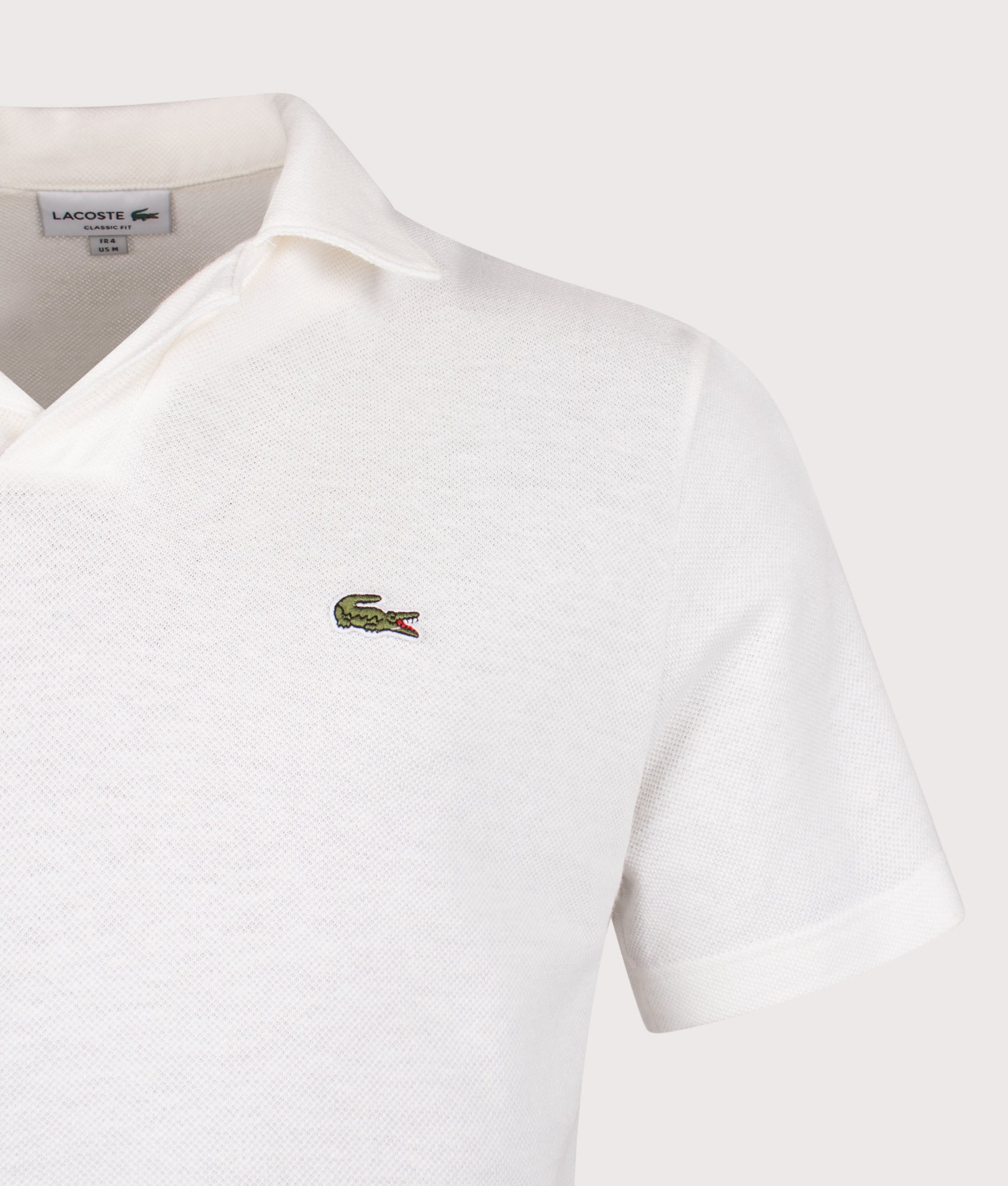 Lacoste Cotton-Linen Polo Shirt in Flour at EQVVS Menswear. Detail shot.
