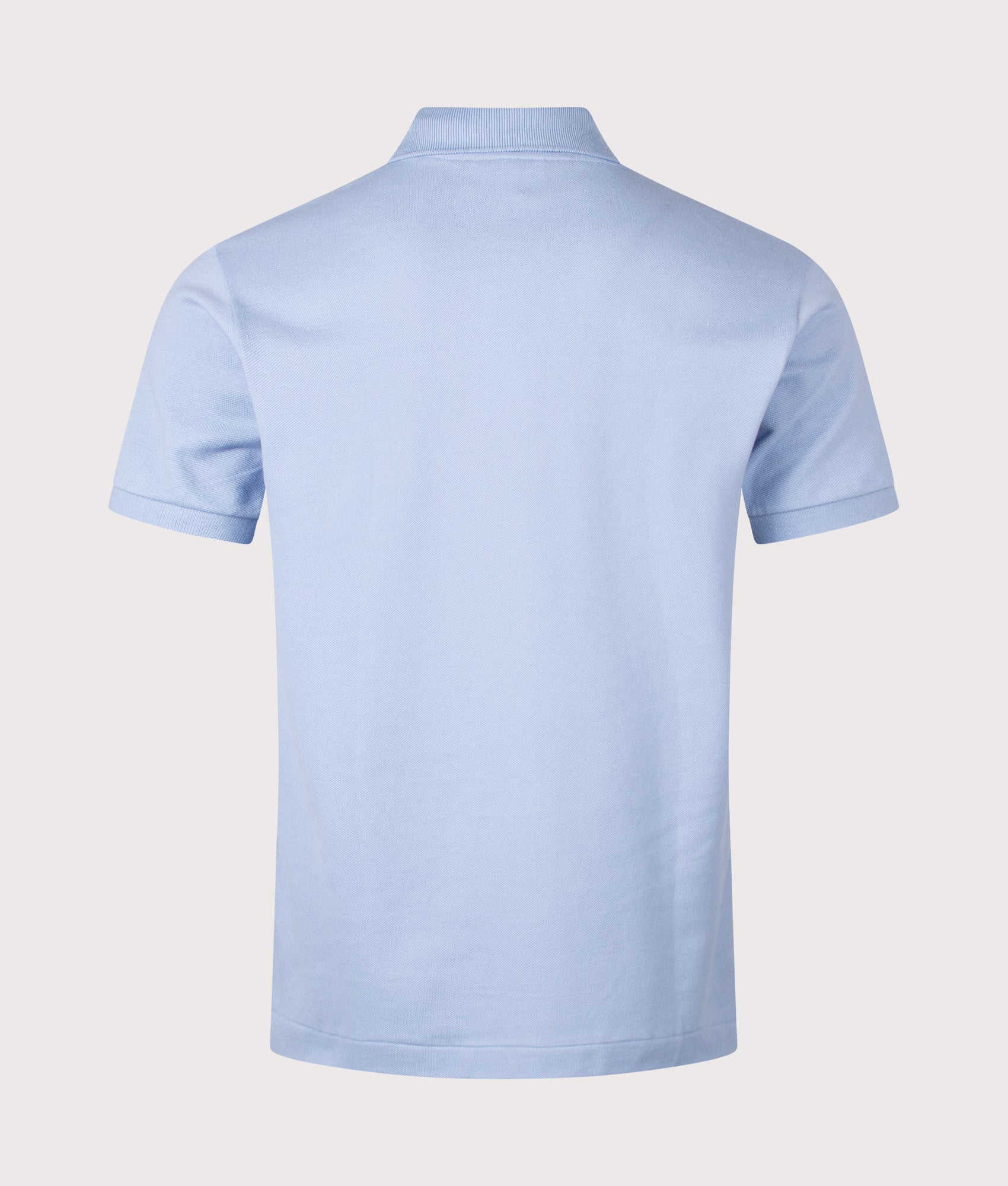 Lacoste Classic Fit L1212 Croc Logo Polo Shirt in Light Blue at EQVVS Menswear. Back shot.