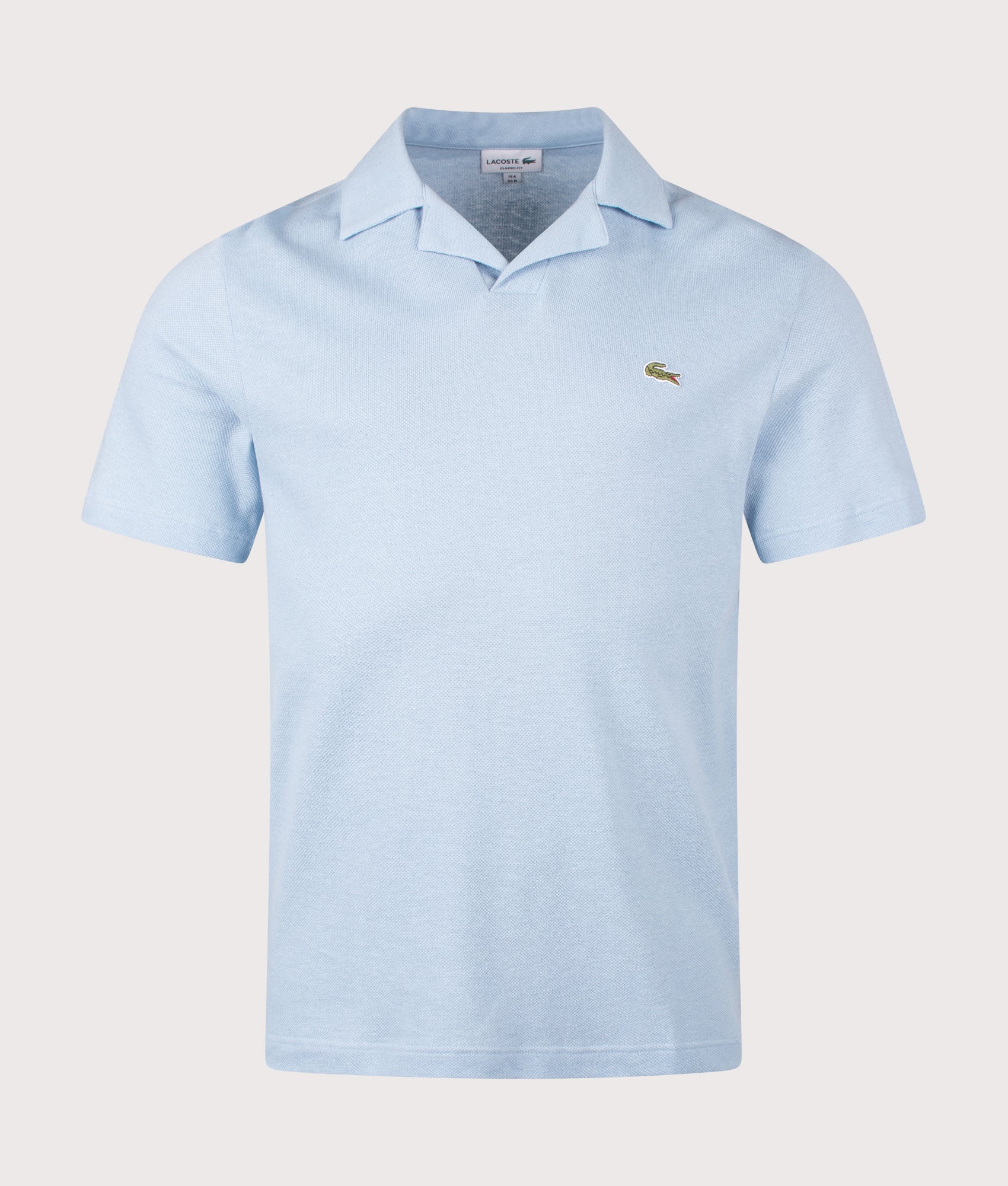 Lacoste Cotton-Linen Polo Shirt in Chambray at EQVVS Menswear. Front shot.