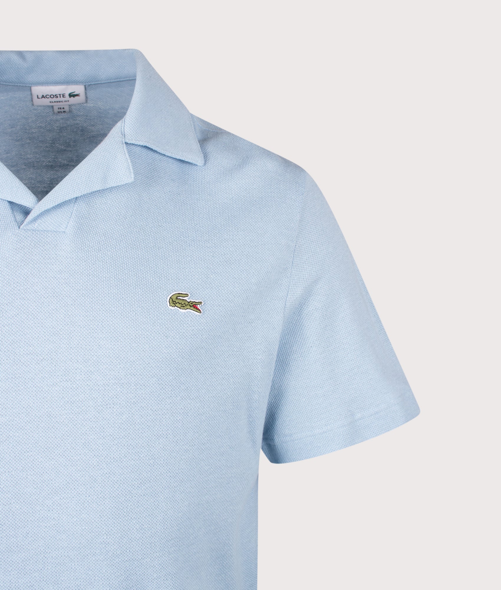 Lacoste Cotton-Linen Polo Shirt in Chambray at EQVVS Menswear. Detail shot.