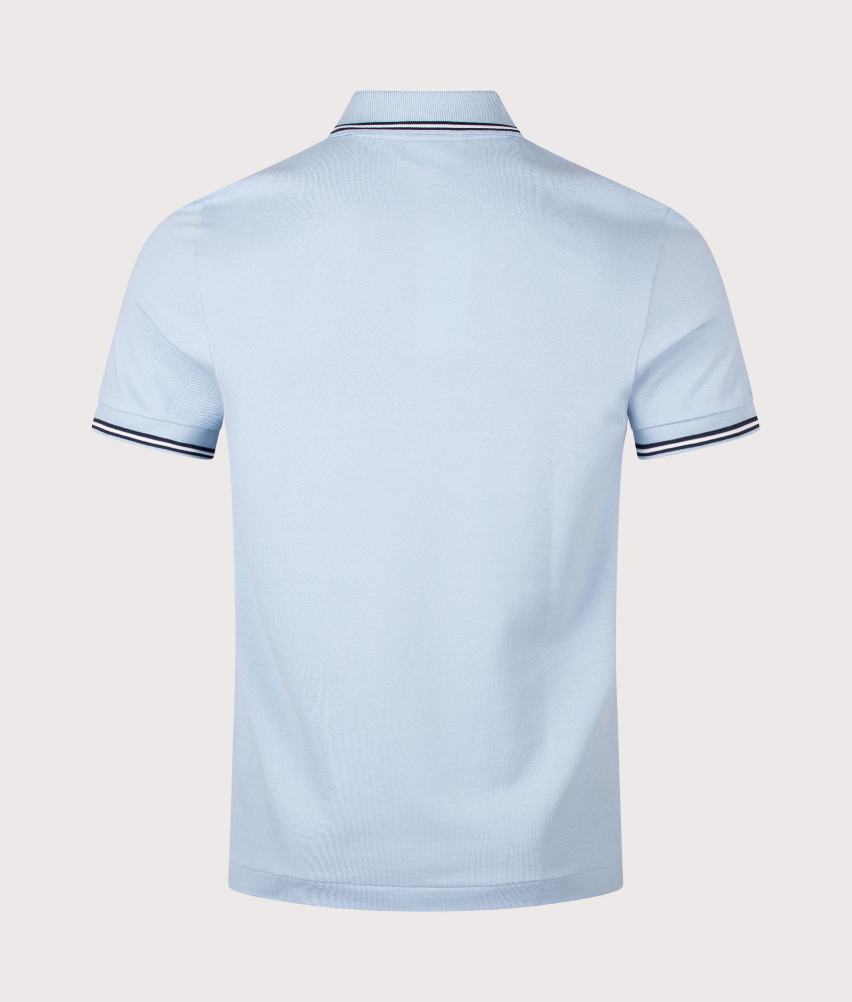 Lacoste Regular Fit Tipped Polo Shirt in Light Blue at EQVVS Menswear. Back shot.