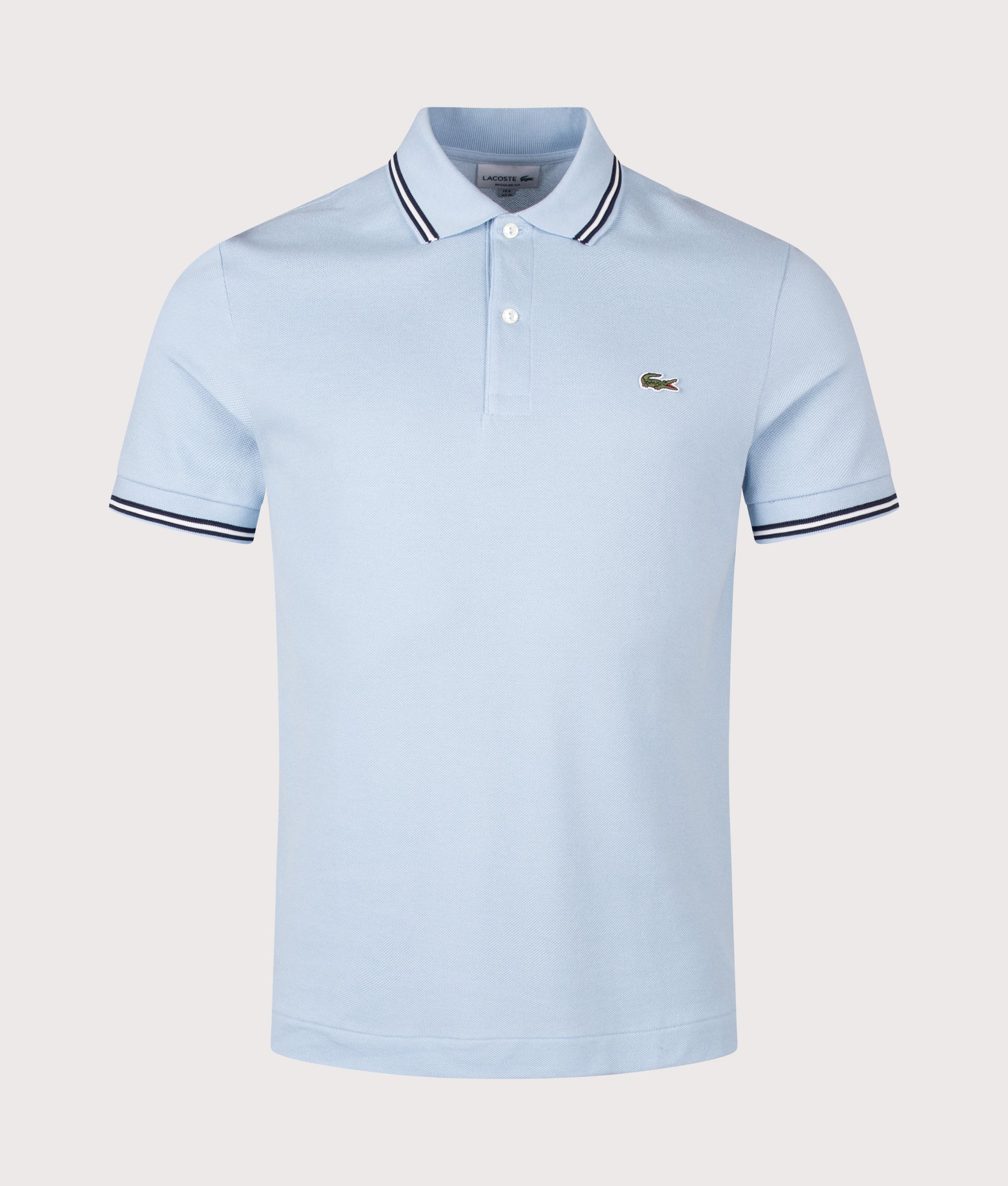 Lacoste Regular Fit Tipped Polo Shirt in Light Blue at EQVVS Menswear. Front shot.