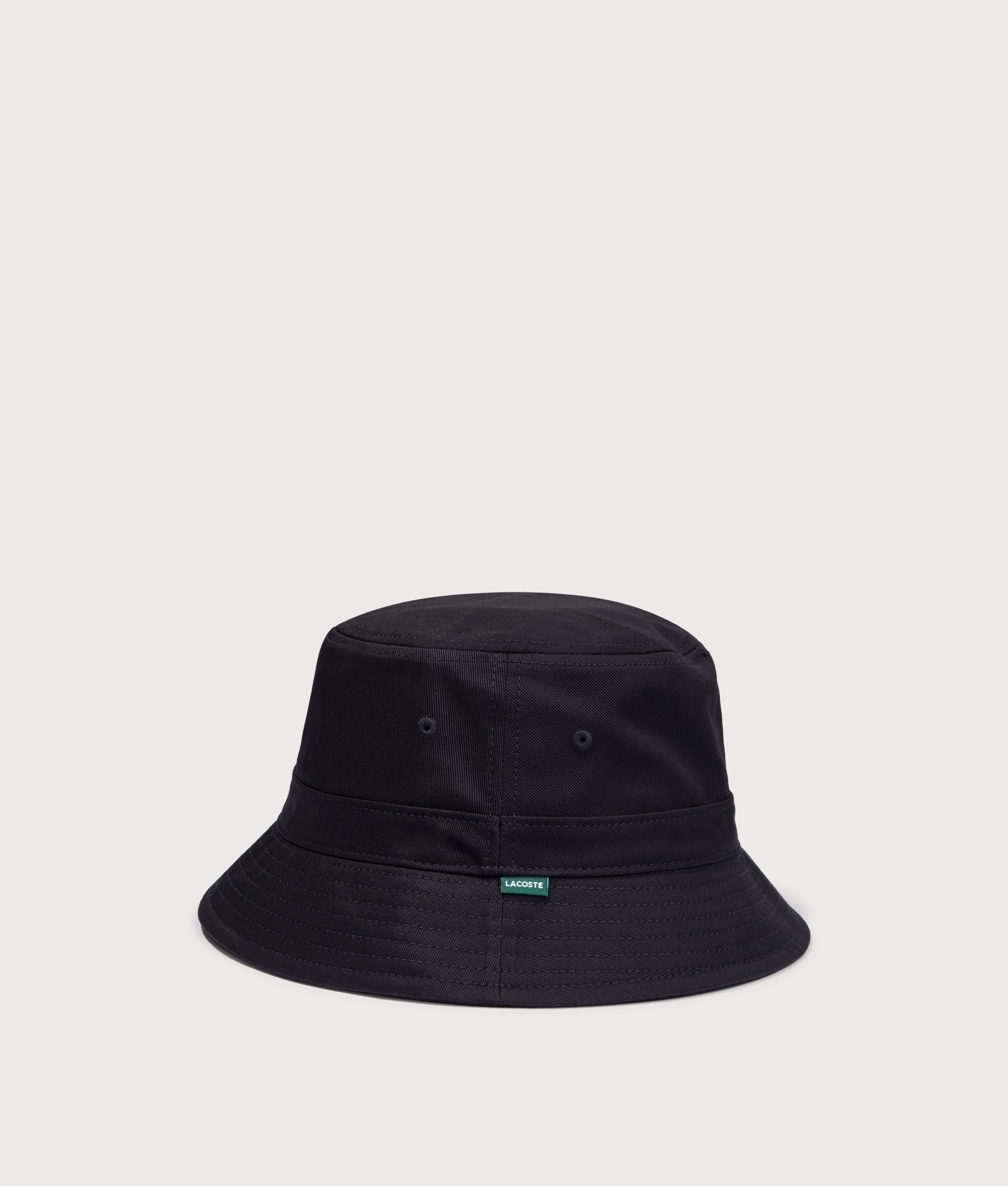 Piqué Bucket Hat in Black by Lacoste. Shot by EQVVS. Back shot.