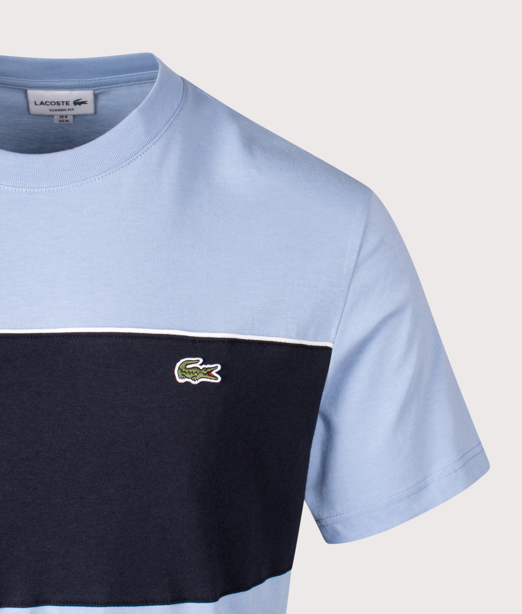 Lacoste Colour Block T-Shirt in Aphylla and Blackbird at EQVVS Menswear. Detail shot.