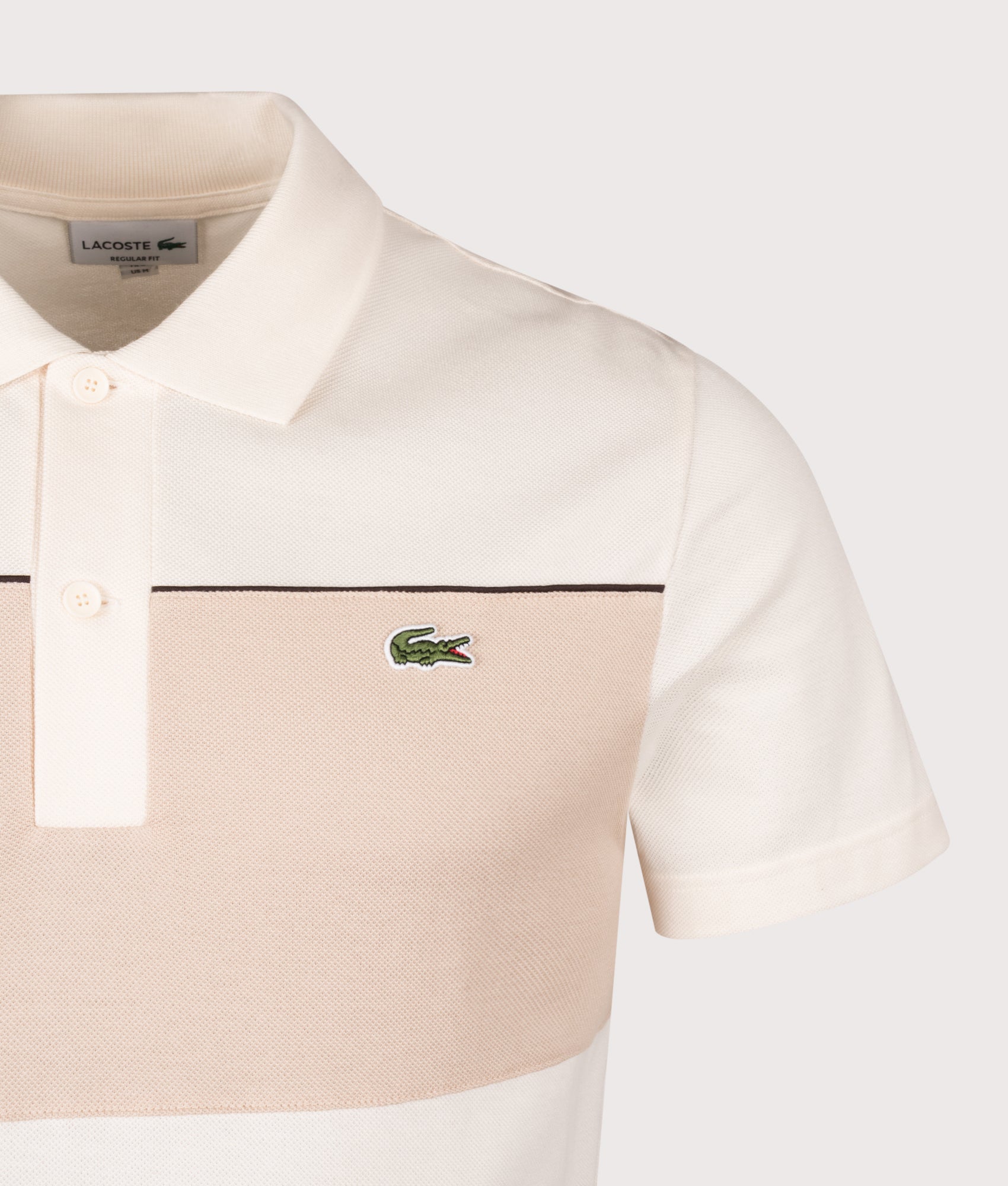 Lacoste Colour Block Piqué Polo Shirt Lapland and Lionne at EQVVS Menswear. Detail shot.