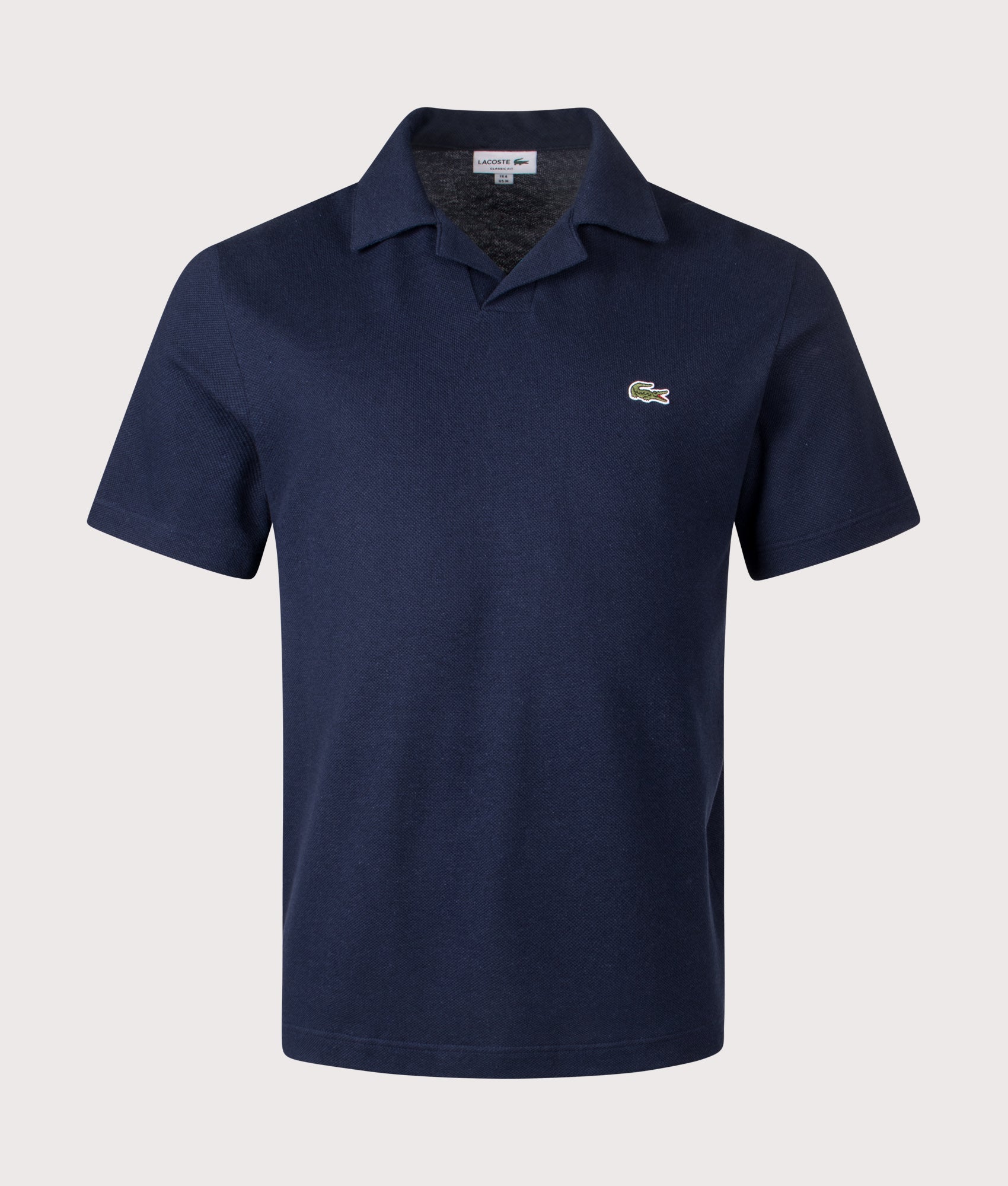 Lacoste Cotton-Linen Polo Shirt in Navy Blue at EQVVS Menswear. Front shot.
