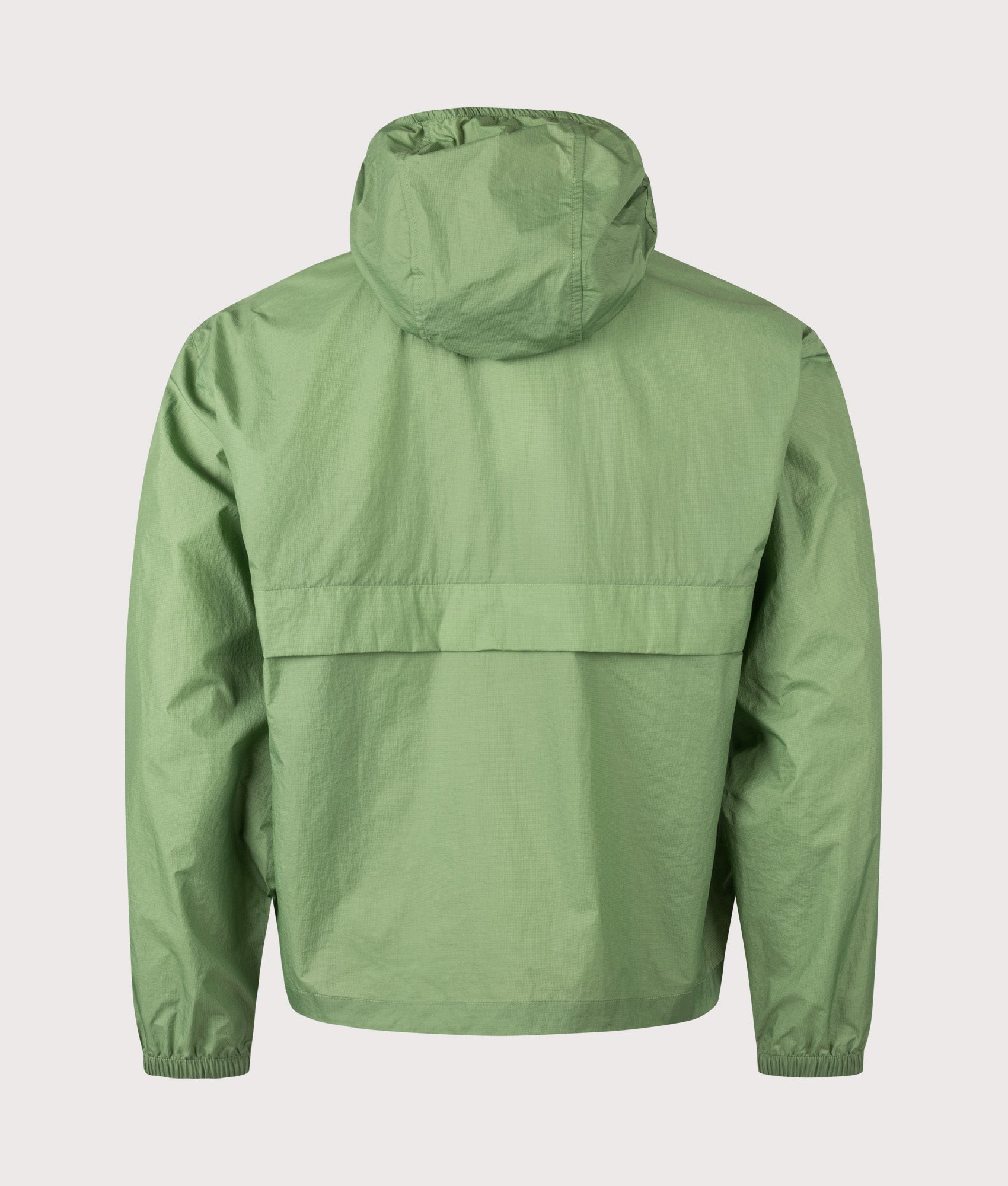 Lacoste Lightweight Packable Jacket in Green at EQVVS Menswear. Back shot.