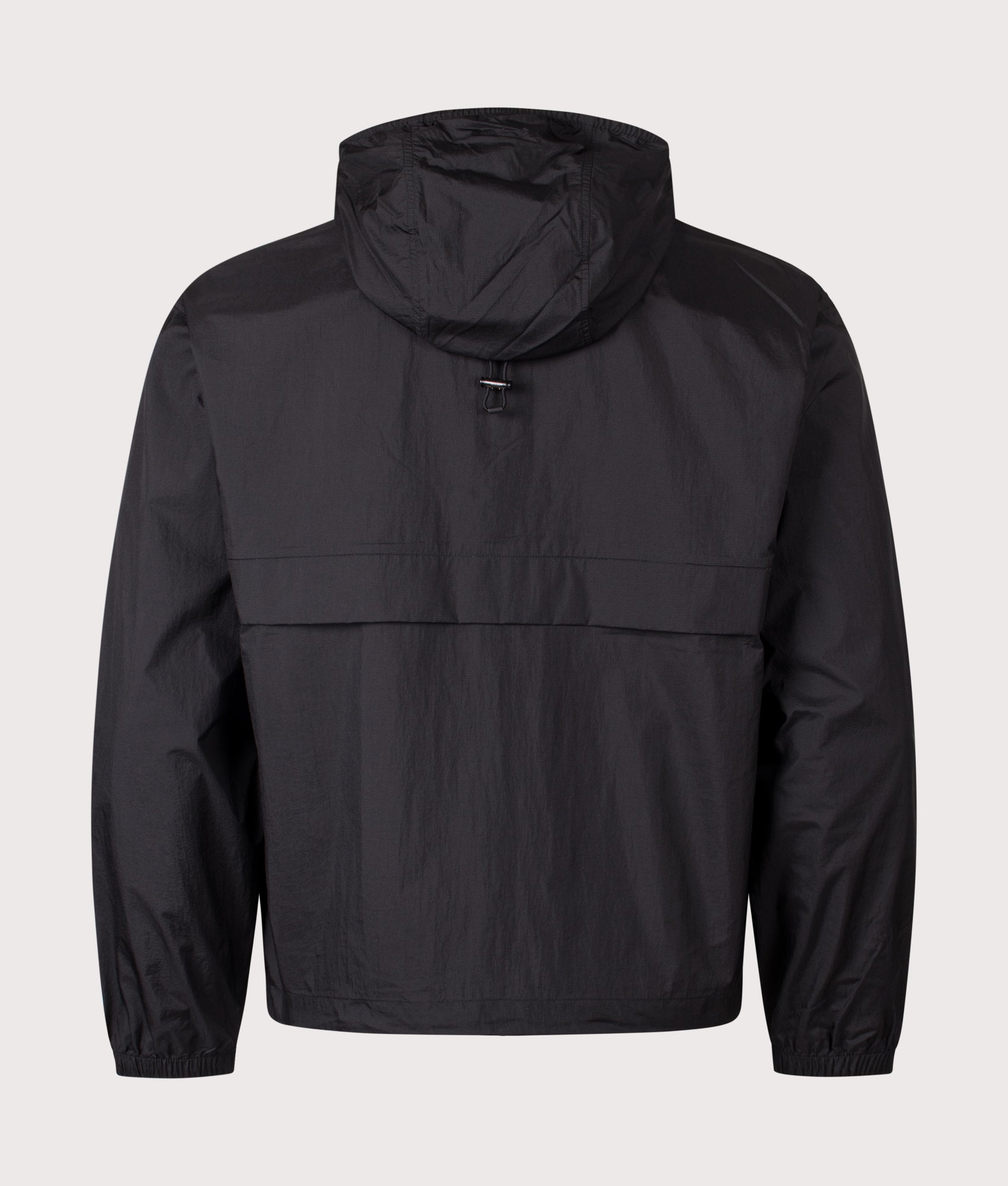 Lacoste Lightweight Packable Jacket in Black at EQVVS Menswear. Back shot.