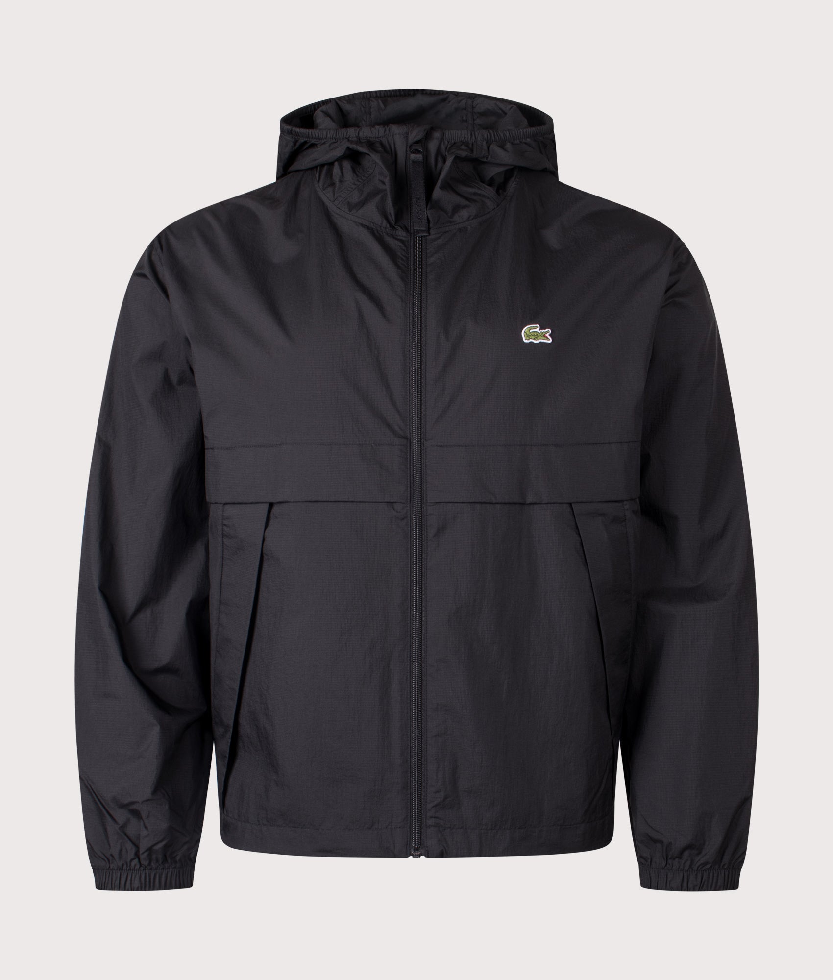 Lacoste Lightweight Packable Jacket in Black at EQVVS Menswear. Front shot.