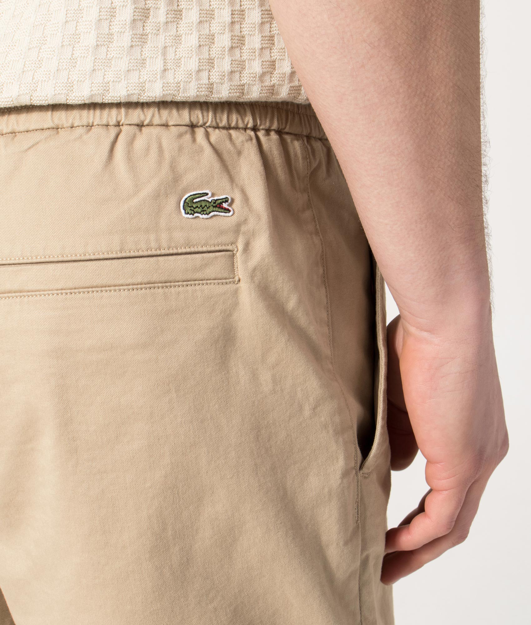 Lacoste Regular Fit Stretch Cotton Chino Shorts in Viennese Beige at EQVVS Menswear. Back detail shot.