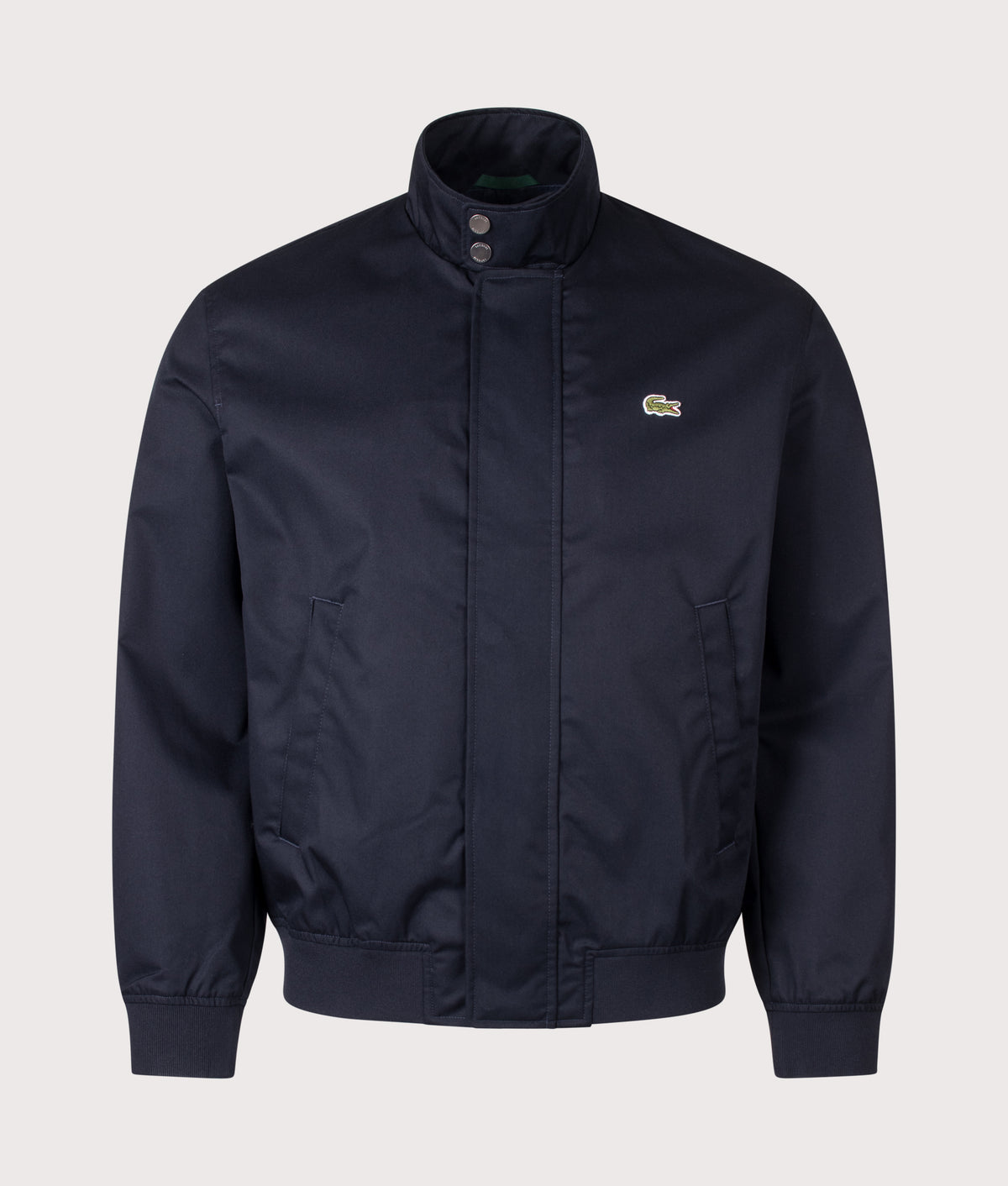Lacoste Regular Fit Water-Repellent Twill Harrington Jacket in Abysm at EQVVS Menswear. Front shot.
