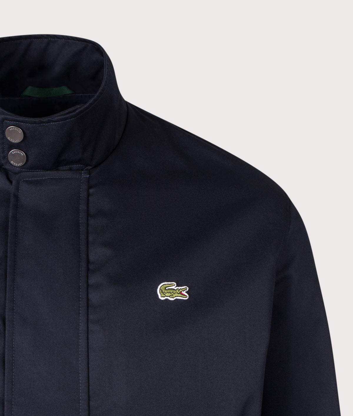 Lacoste Regular Fit Water-Repellent Twill Harrington Jacket in Abysm at EQVVS Menswear. Detail shot.