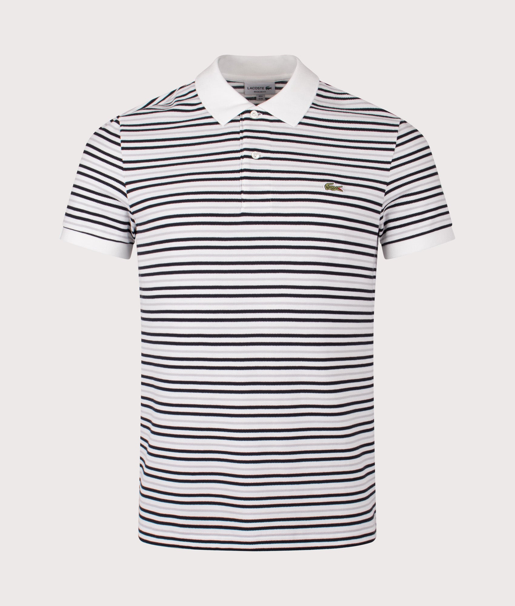 Lacoste Striped Petit Piqué Polo Shirt in Blackbird and Flour at EQVVS Menswear. Front shot.