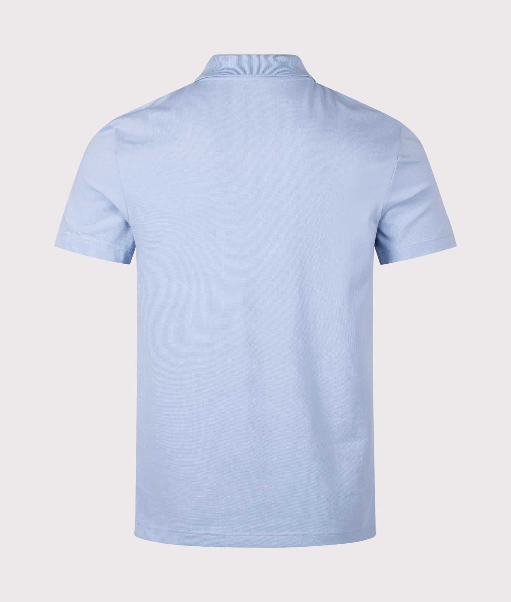 Lacoste Regular Fit Cotton Blend Polo Shirt in Light Blue at EQVVS Menswear. Back shot.