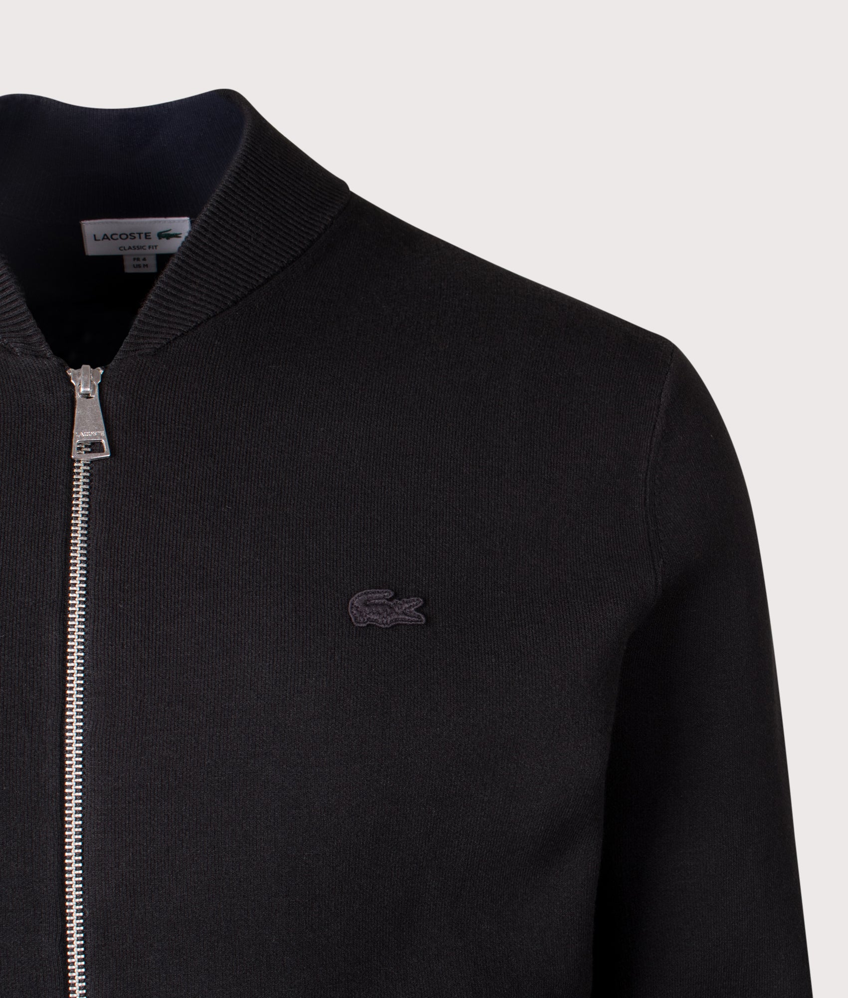 Lacoste Zip Through Double Knit Bomber Jacket in Black at EQVVS Menswear. Detail shot.