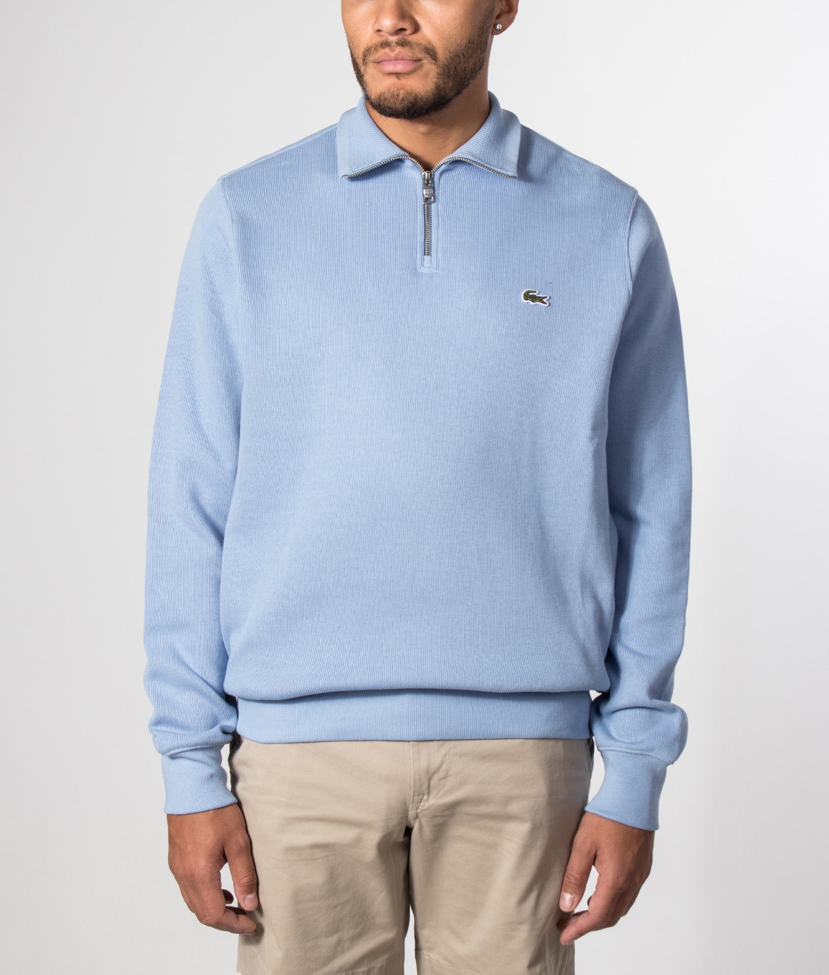 Lacoste Quarter Zip Croc Logo Sweatshirt in Aphylla at EQVVS Menswear. Model front shot.