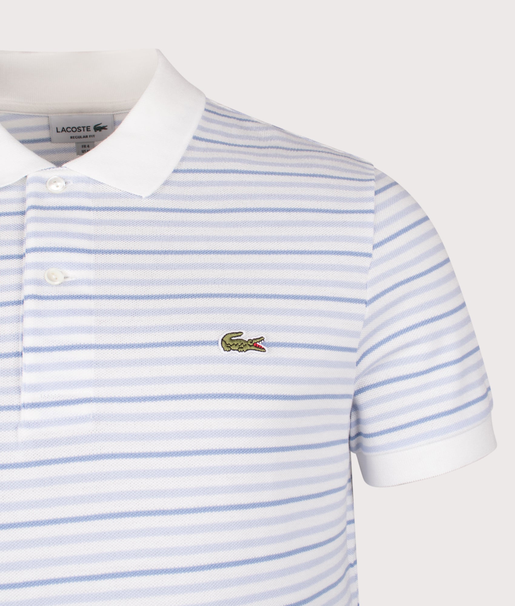 Lacoste Rib Collar Striped Polo Shirt in Phoenix Blue and Flour at EQVVS Menswear. Detail shot.