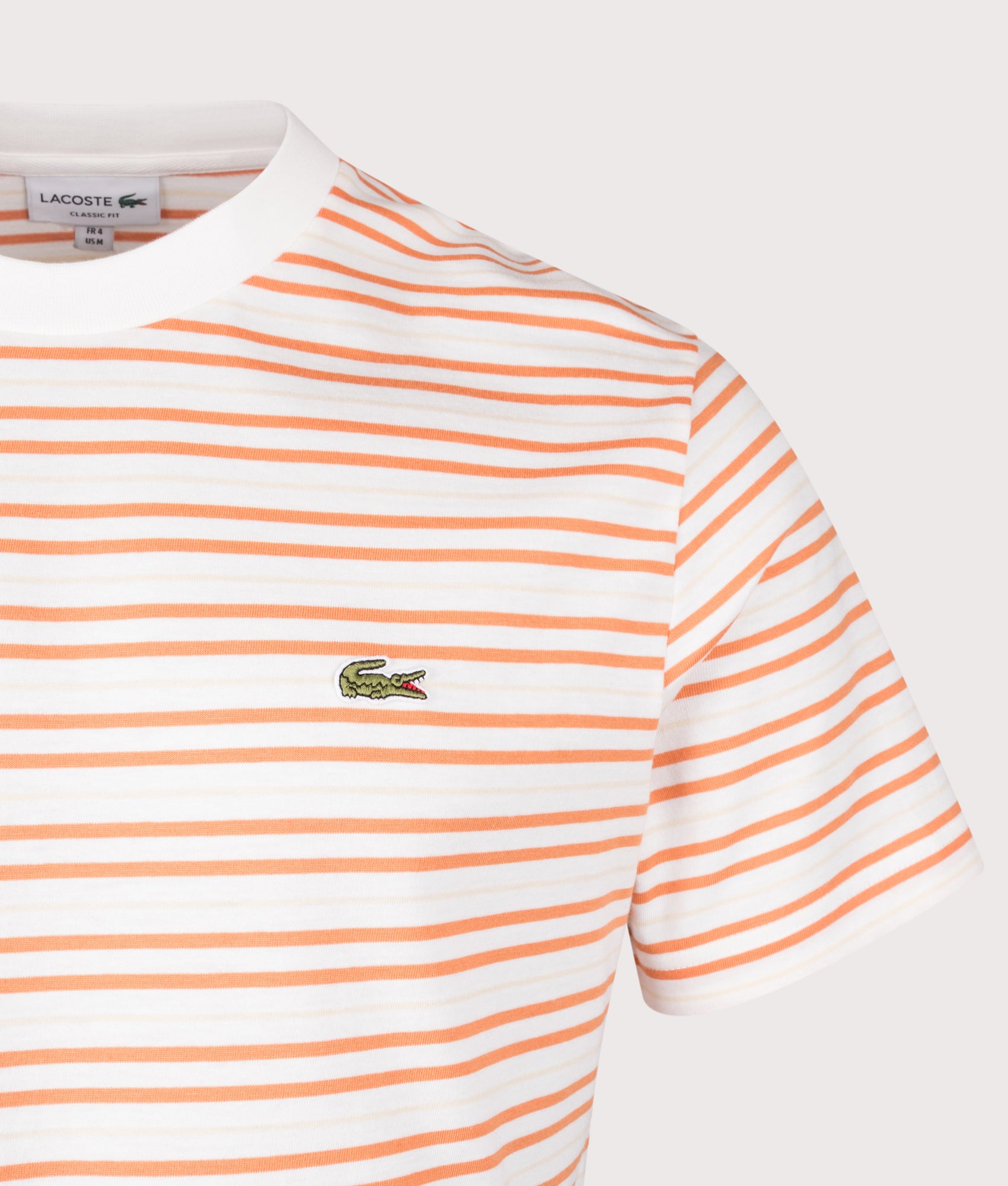Lacoste Striped T-Shirt in Blossom and Flour at EQVVS Menswear. Detail shot.