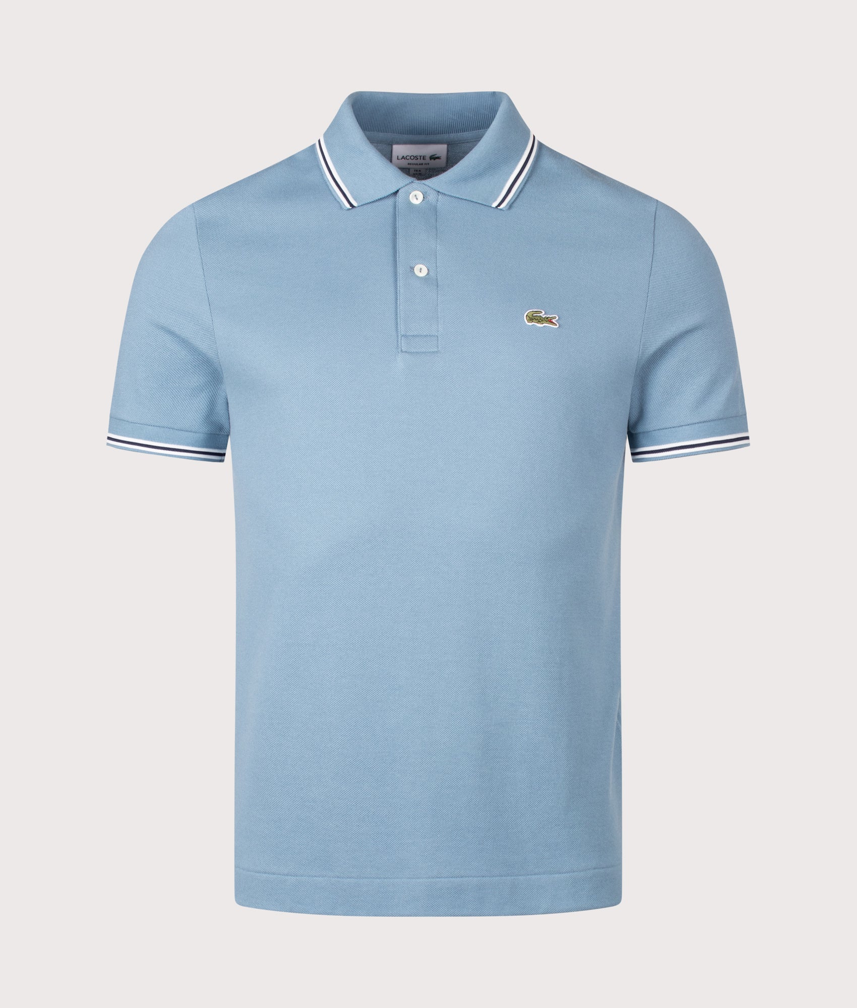 Lacoste Regular Fit Tipped Polo Shirt in Grayish Blue at EQVVS Menswear. Front shot.