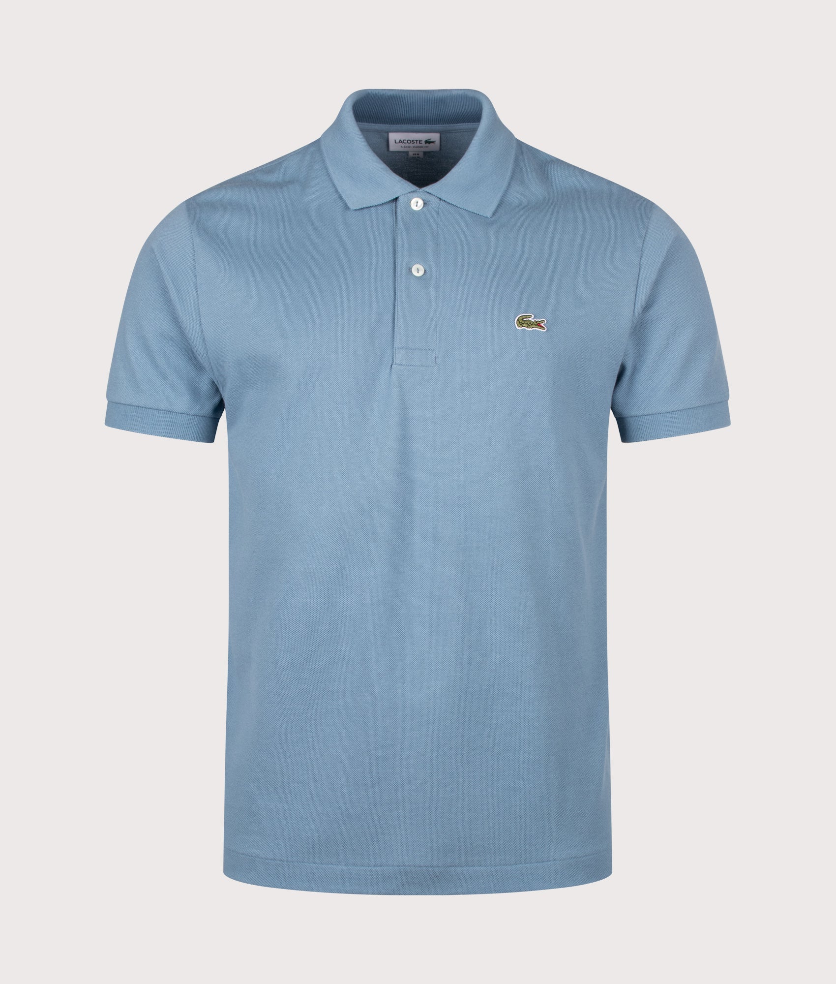 Lacoste Classic Fit L1212 Croc Logo Polo Shirt in Blue at EQVVS Menswear. Front shot.