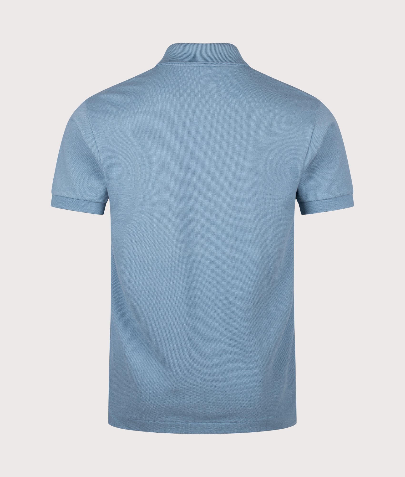 Lacoste Classic Fit L1212 Croc Logo Polo Shirt in Blue at EQVVS Menswear. Back shot.