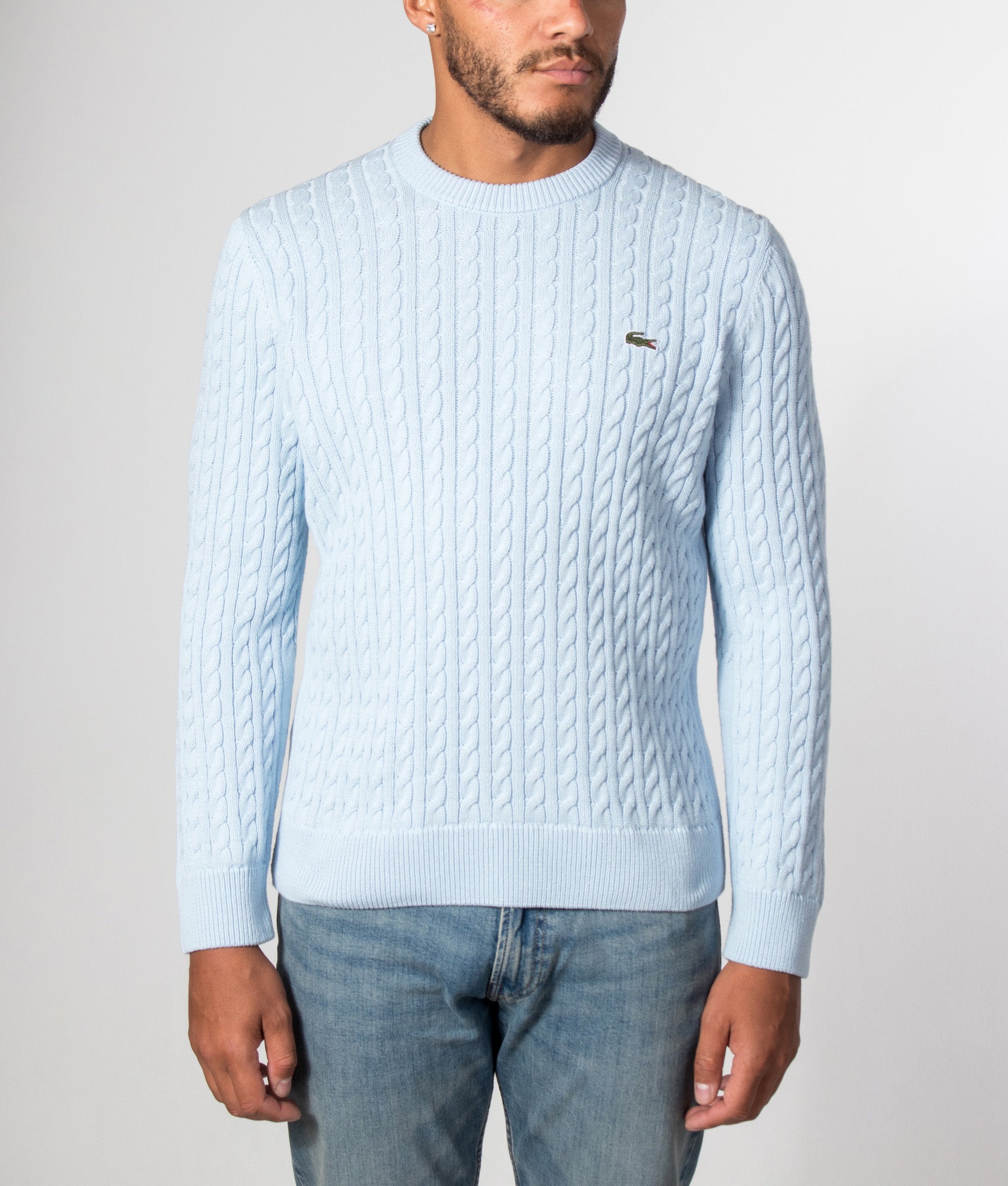 Lacoste Regular Fit Cable Knitted Jumper in Rill and Green at EQVVS Menswear. Model front shot.
