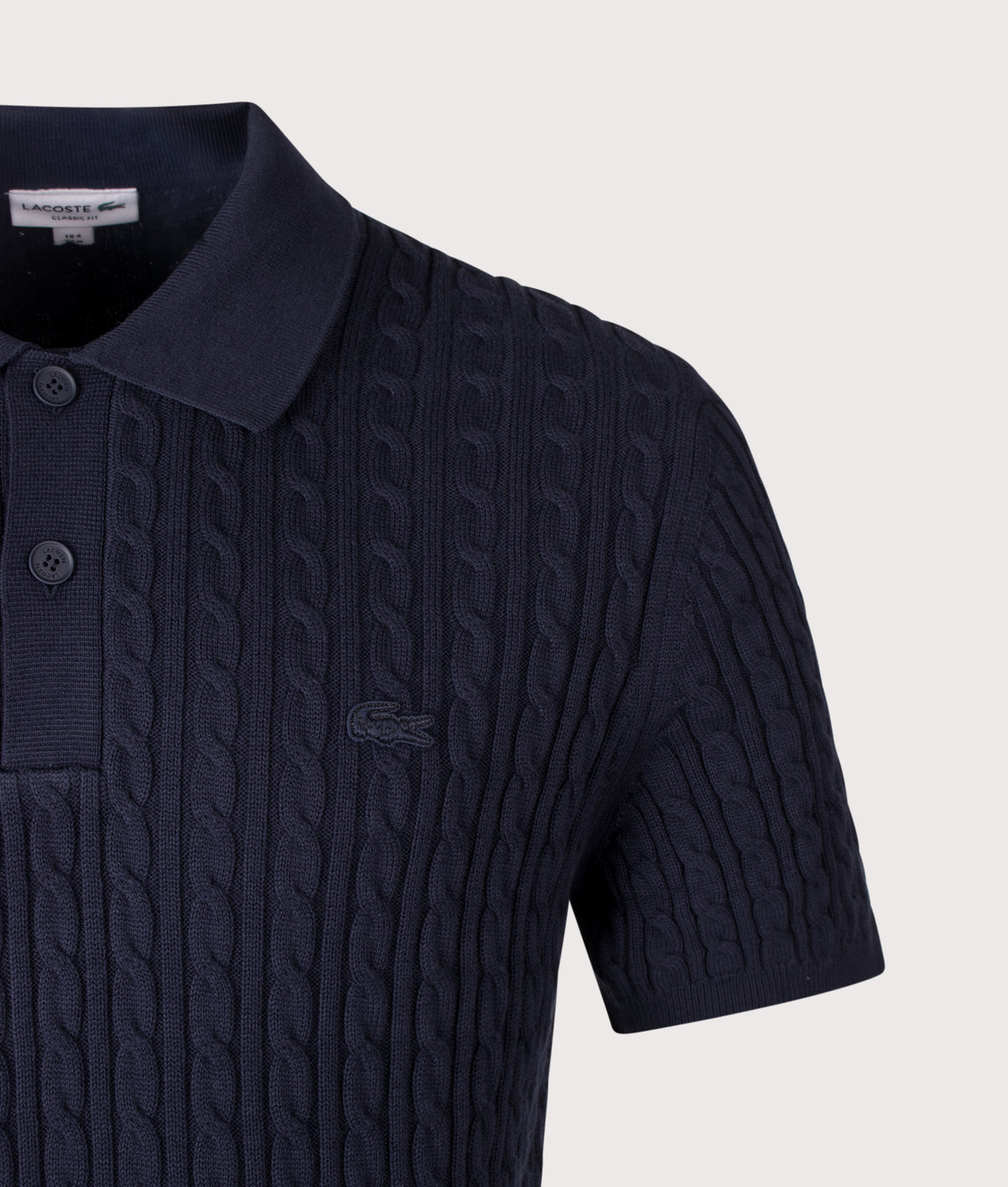 Lacoste Regular Fit Cable Knitted Polo Shirt  in Dark Navy Blue and Green at EQVVS Menswear. Detail shot.