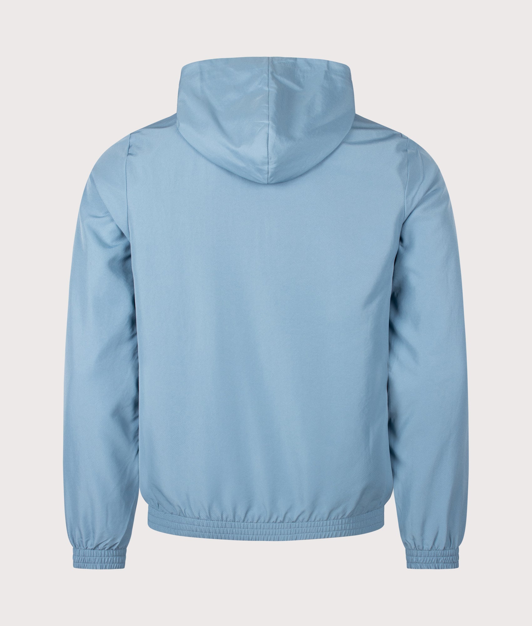 Lacoste Regular Fit Water-Repellent Sport Track Jacket in Aral at EQVVS Menswear. Back shot.