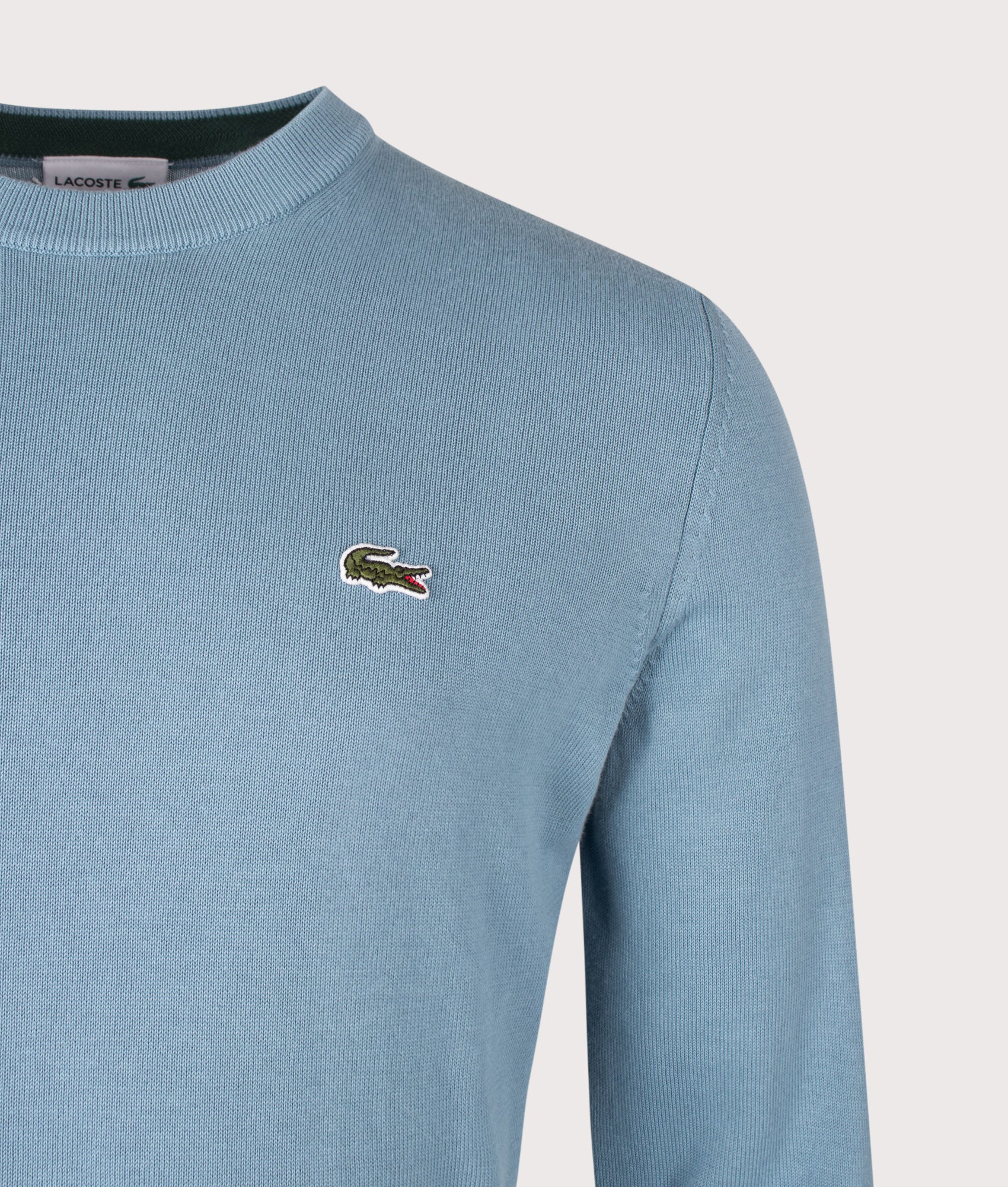 Lacoste Regular Fit Croc Logo Knitted Jumper in Aral at EQVVS Menswear. Detail shot.