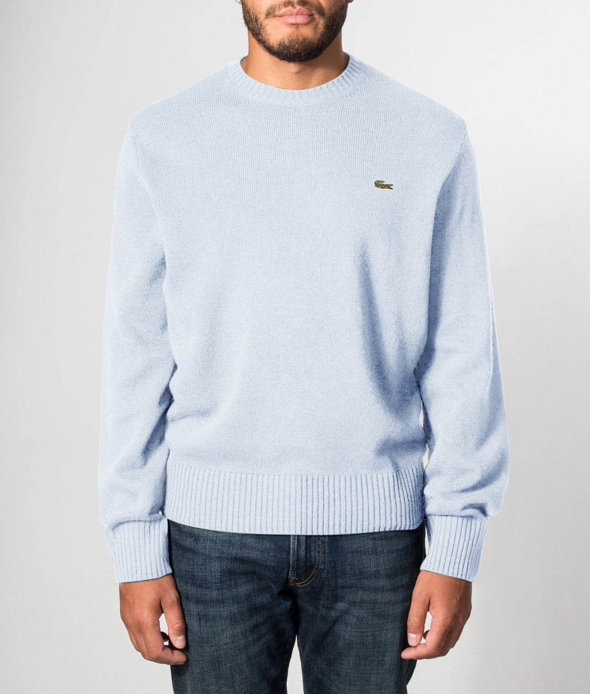Lacoste Classic Fit Wool Crewneck Jumper in Rill at EQVVS Menswear. Front model shot.